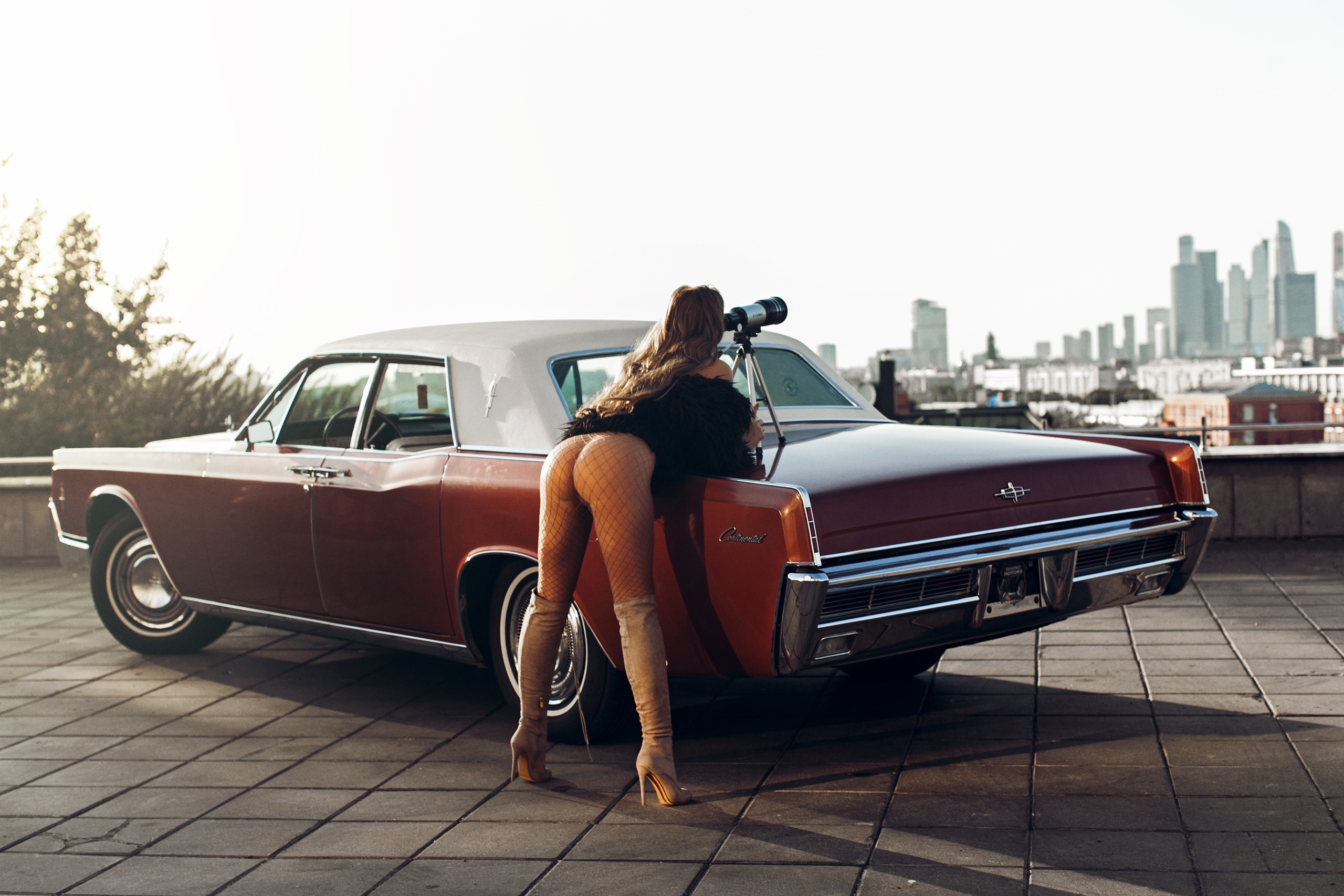 Cool car with naked latina