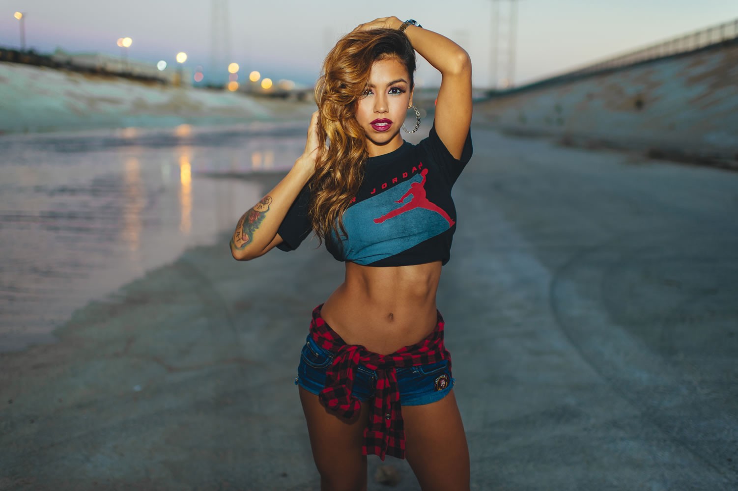 People 1502x1000 blonde women Latinas Stacy Illmami frontal view T-shirt Martin "Depic" Murillo urban model belly slim body inked girls makeup standing jean shorts canal