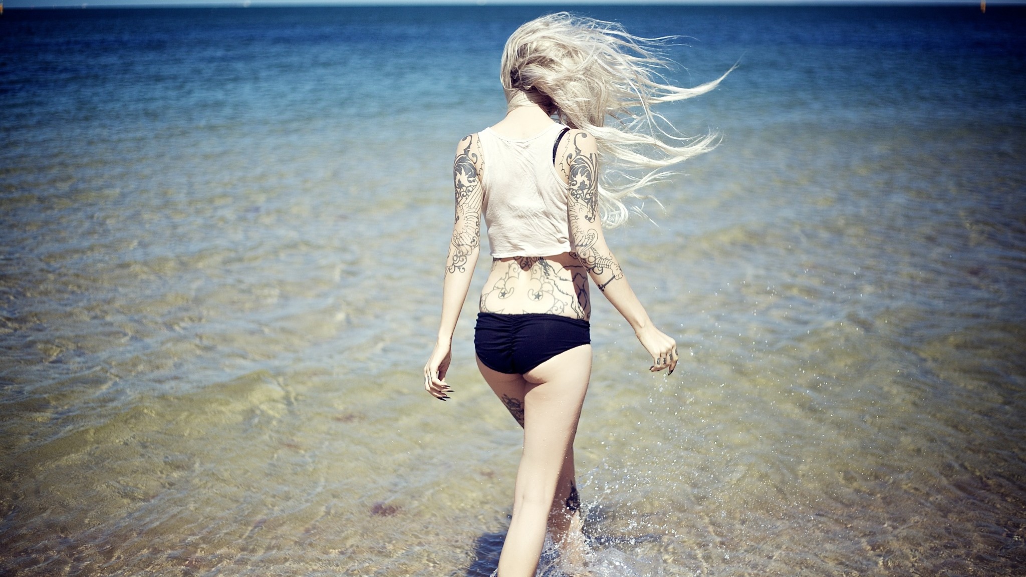 People 2048x1152 Sara Fabel blonde tattoo women model women outdoors inked girls sea