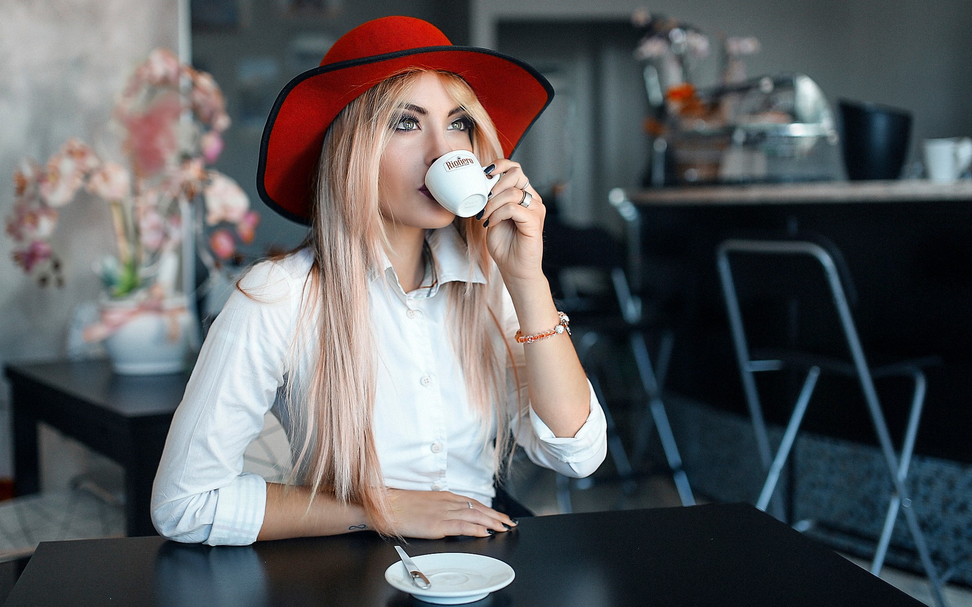 People 1920x1200 women model blonde long hair cafeteria  coffee sitting drink cup table hat blouses tattoo makeup rings flowers depth of field women indoors indoors black nails painted nails women with hats