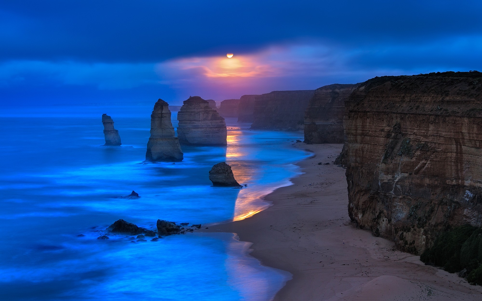 General 2000x1250 nature landscape beach cliff sea coast Twelve Apostles Australia limestone rocks sky clouds low light