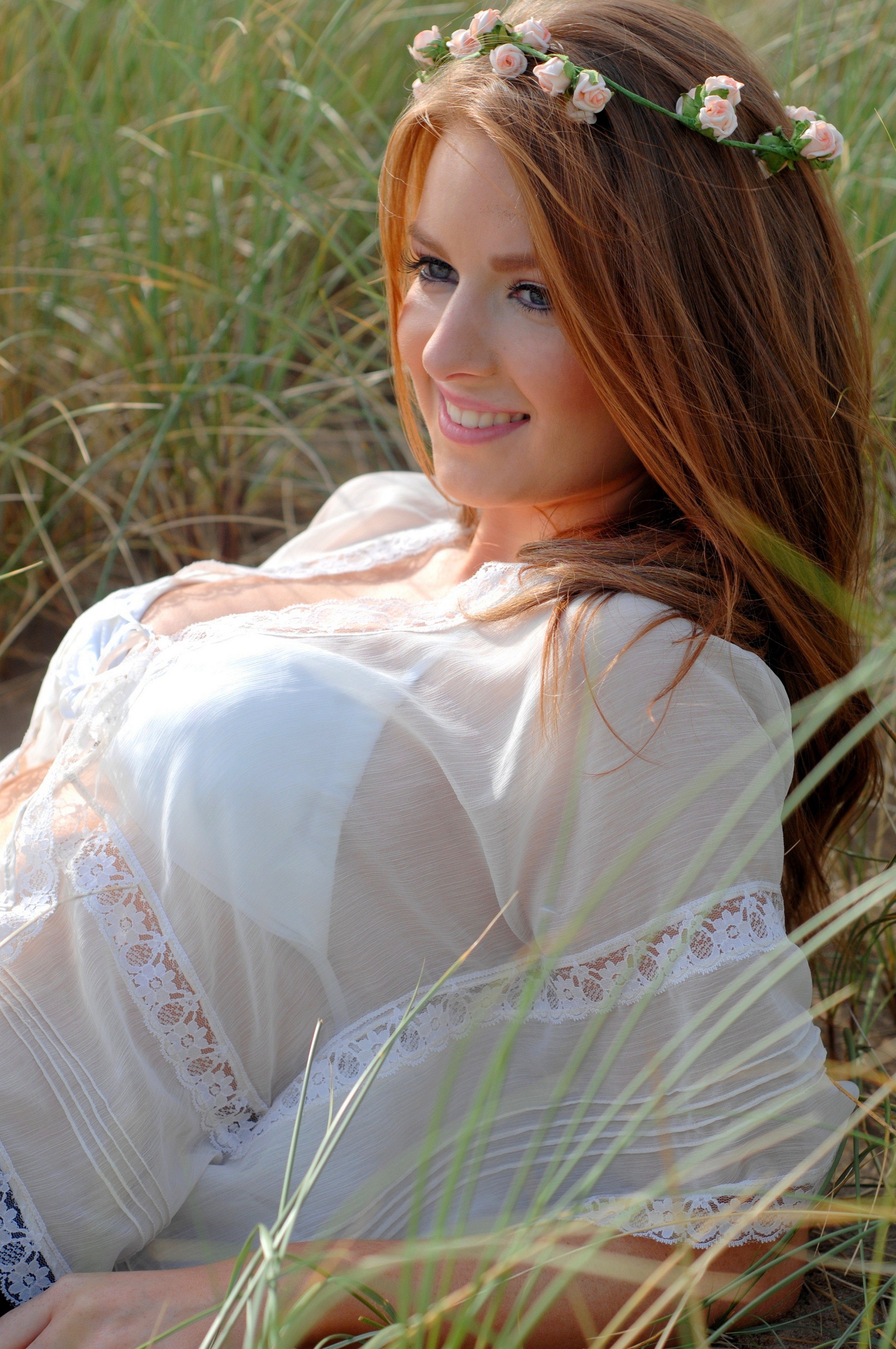 People 2412x3631 women model redhead long hair women outdoors bra see-through clothing blue eyes lying on back ground flower in hair smiling grass blouses nature portrait