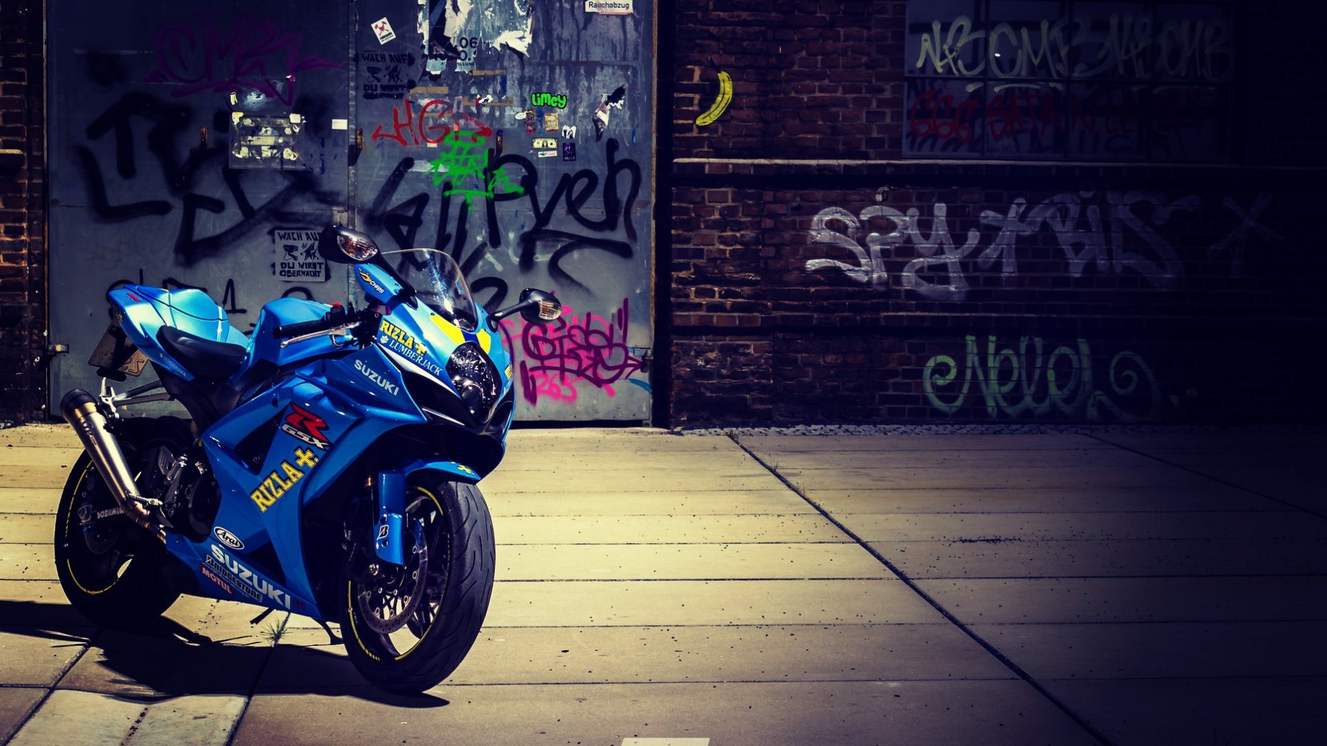 General 1920x1080 Suzuki GSX-R motorcycle graffiti blue urban bricks vehicle Suzuki Japanese motorcycles