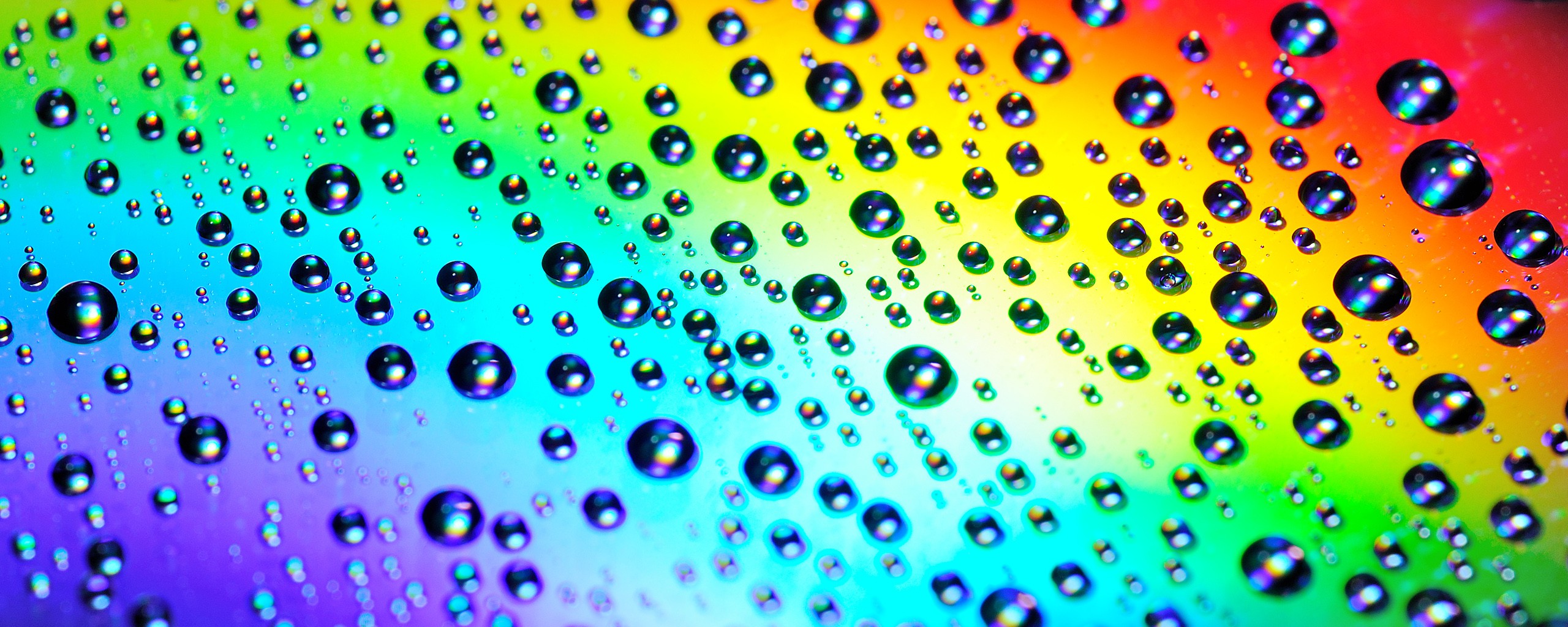 General 2560x1024 water drops rainbows simple background colorful