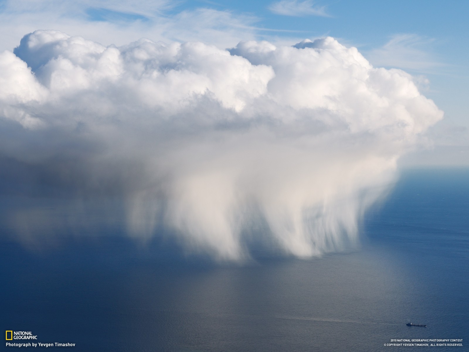 General 1600x1200 National Geographic sea clouds rain heights storm sky nature 2010 (Year) aerial view