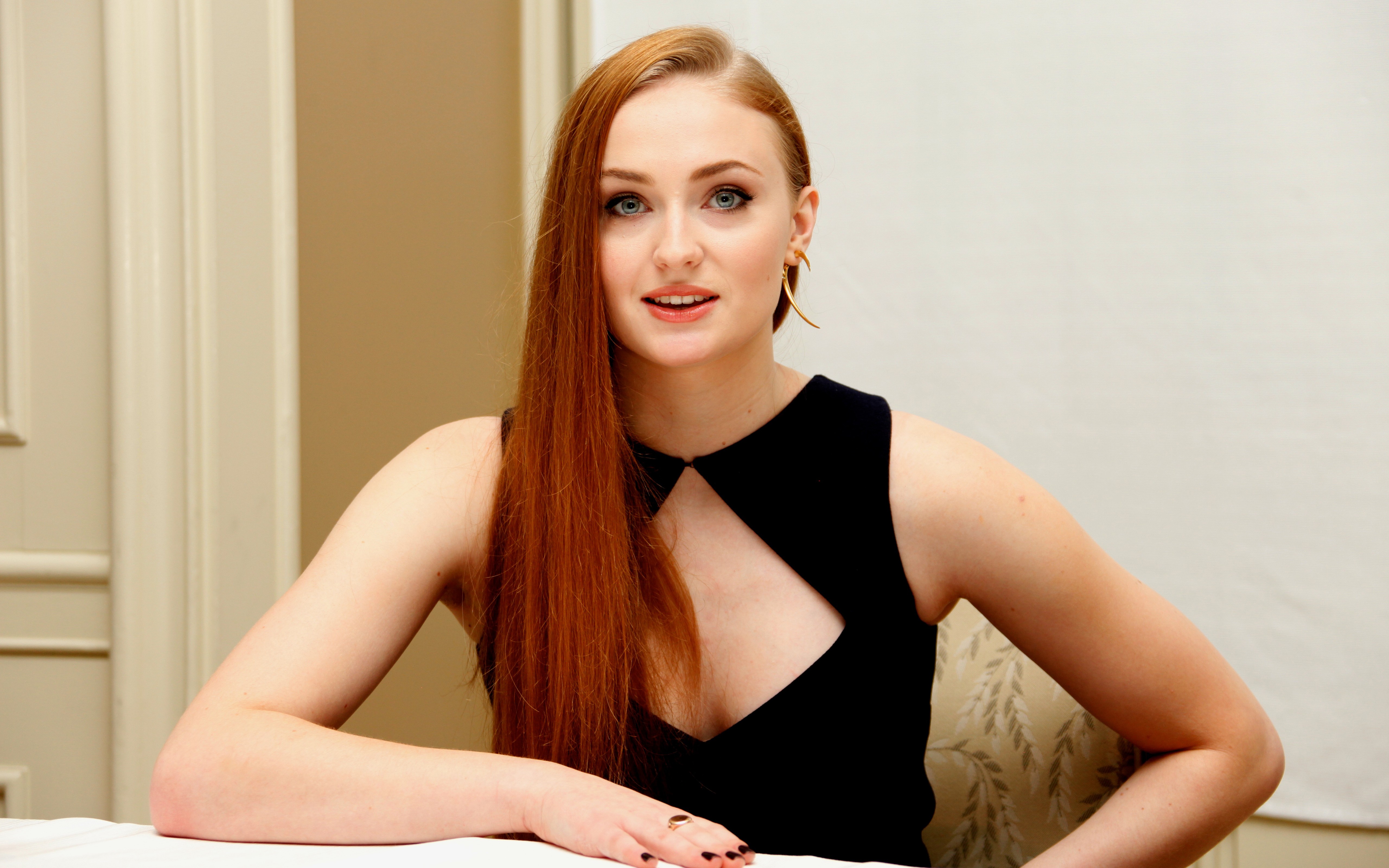People 5120x3200 Sophie Turner women redhead actress celebrity makeup women indoors long hair black dress dress black clothing looking at viewer sitting on chair white wall gray eyes Caucasian glamour glamour girls