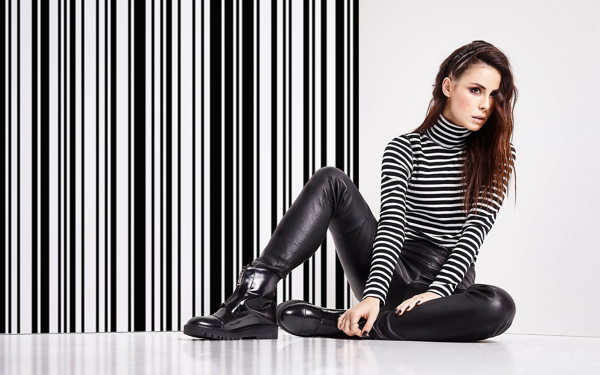 People 2000x1250 Lena Meyer-Landrut singer celebrity women brunette sitting long hair brown eyes looking away turtlenecks leather pants  German women striped clothing women indoors indoors black nails painted nails