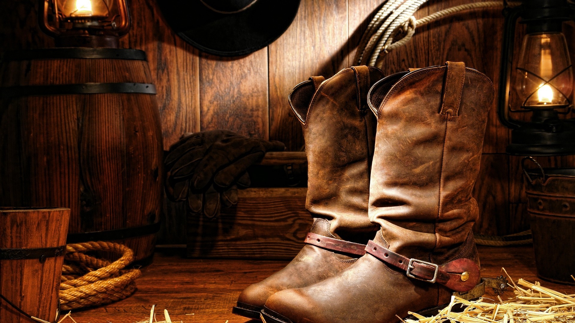 General 1920x1080 boots western shoes ropes hay wooden surface barrels lantern warm colors brown