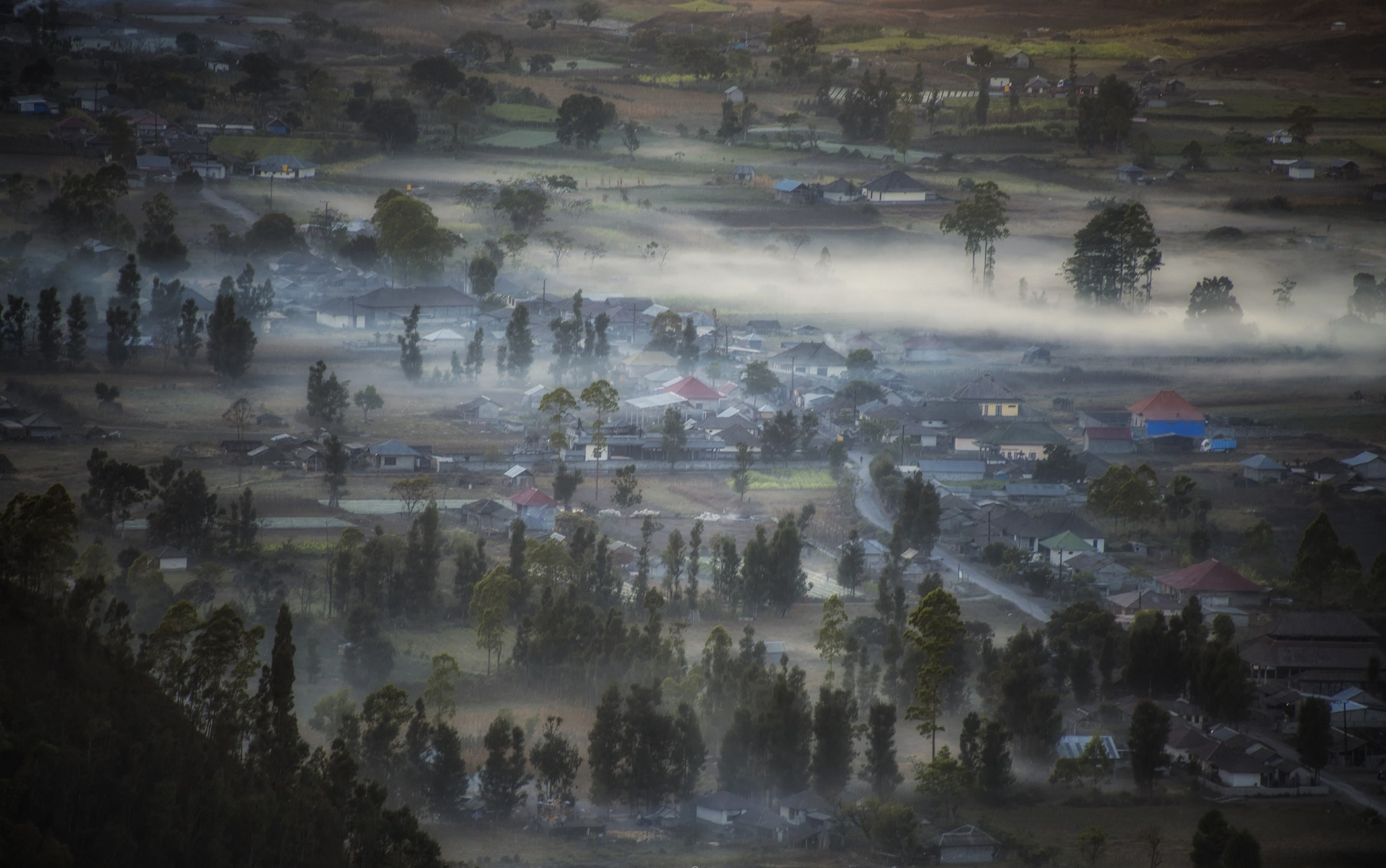 General 2100x1315 landscape mist valley village trees morning Indonesia