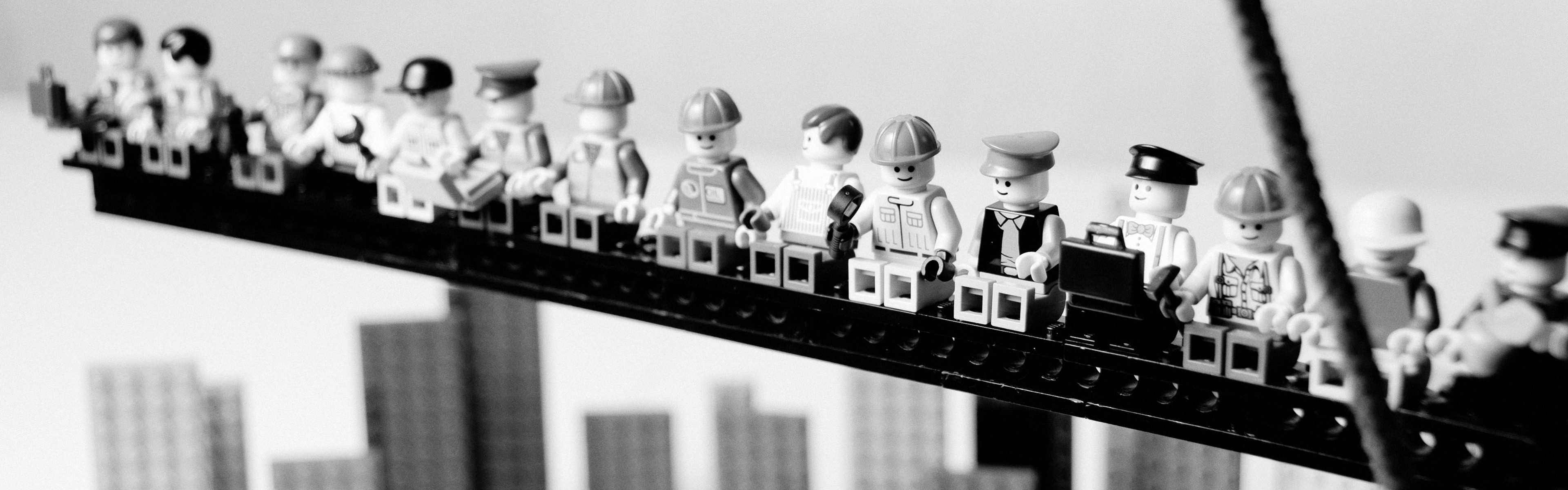 General 3840x1200 monochrome toys LEGO parody skyscraper workers figurines