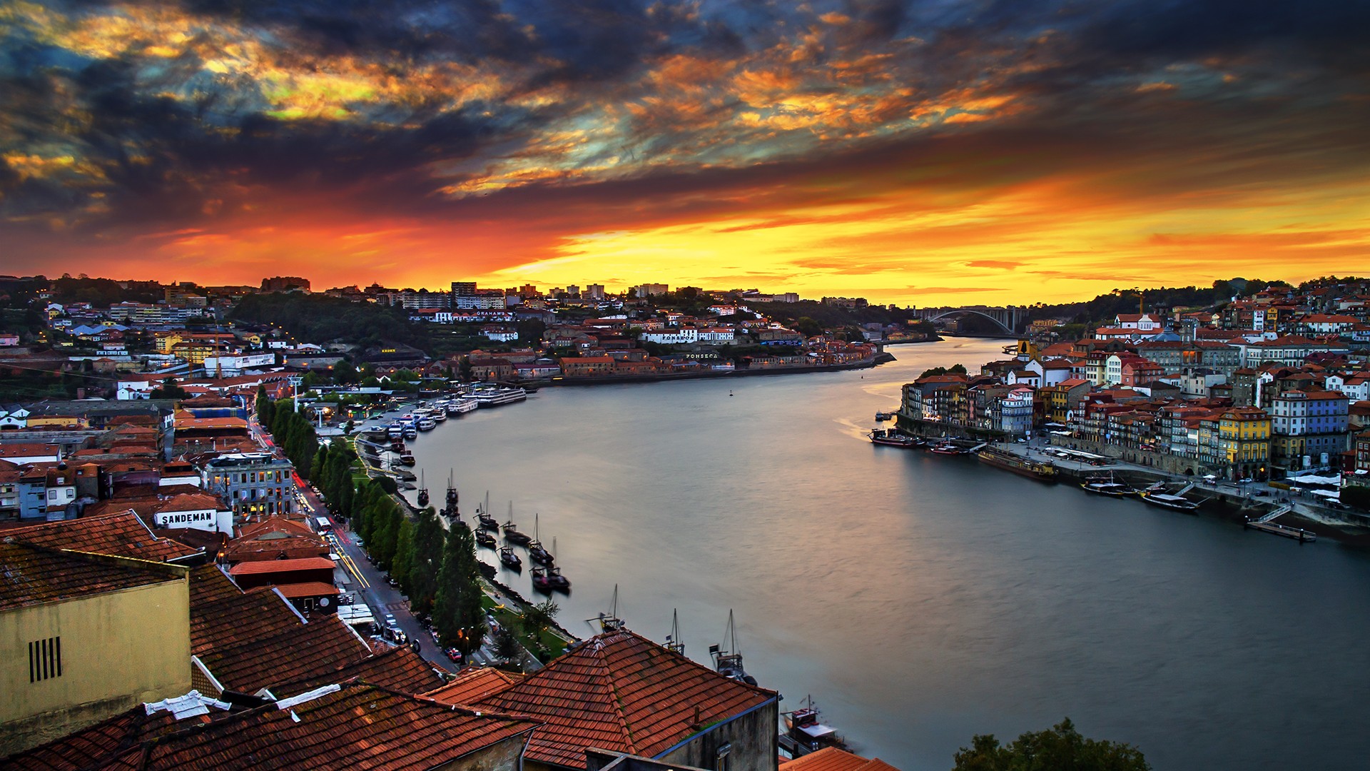 General 1920x1080 Portugal Porto house river sunset bridge boat overcast cityscape orange sky sky clouds