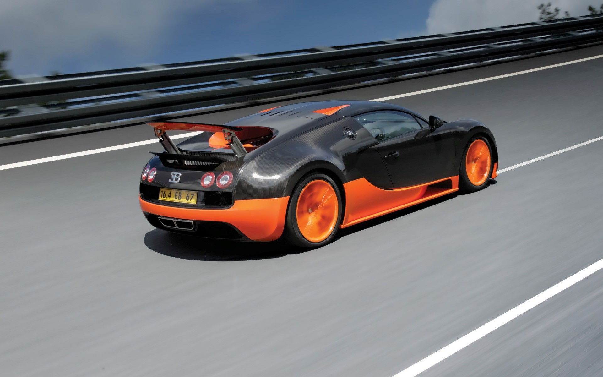 General 1920x1200 Bugatti Veyron 16.4 Super Sport Bugatti Veyron Super Sport Bugatti black cars orange cars vehicle car racing numbers French Cars Volkswagen Group Hypercar