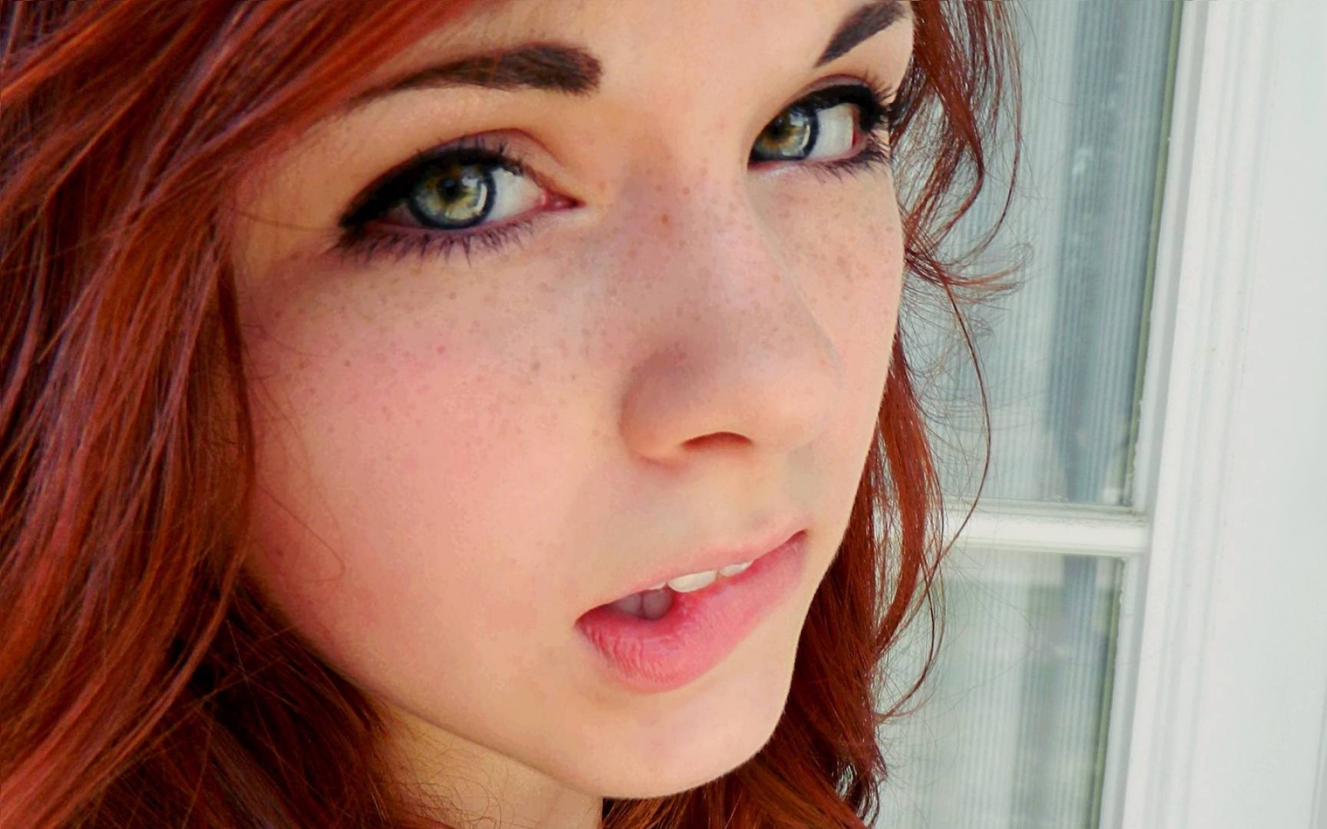 People 1920x1200 face eyes mouth women closeup redhead biting lips freckles green eyes looking at viewer Claire Monnier