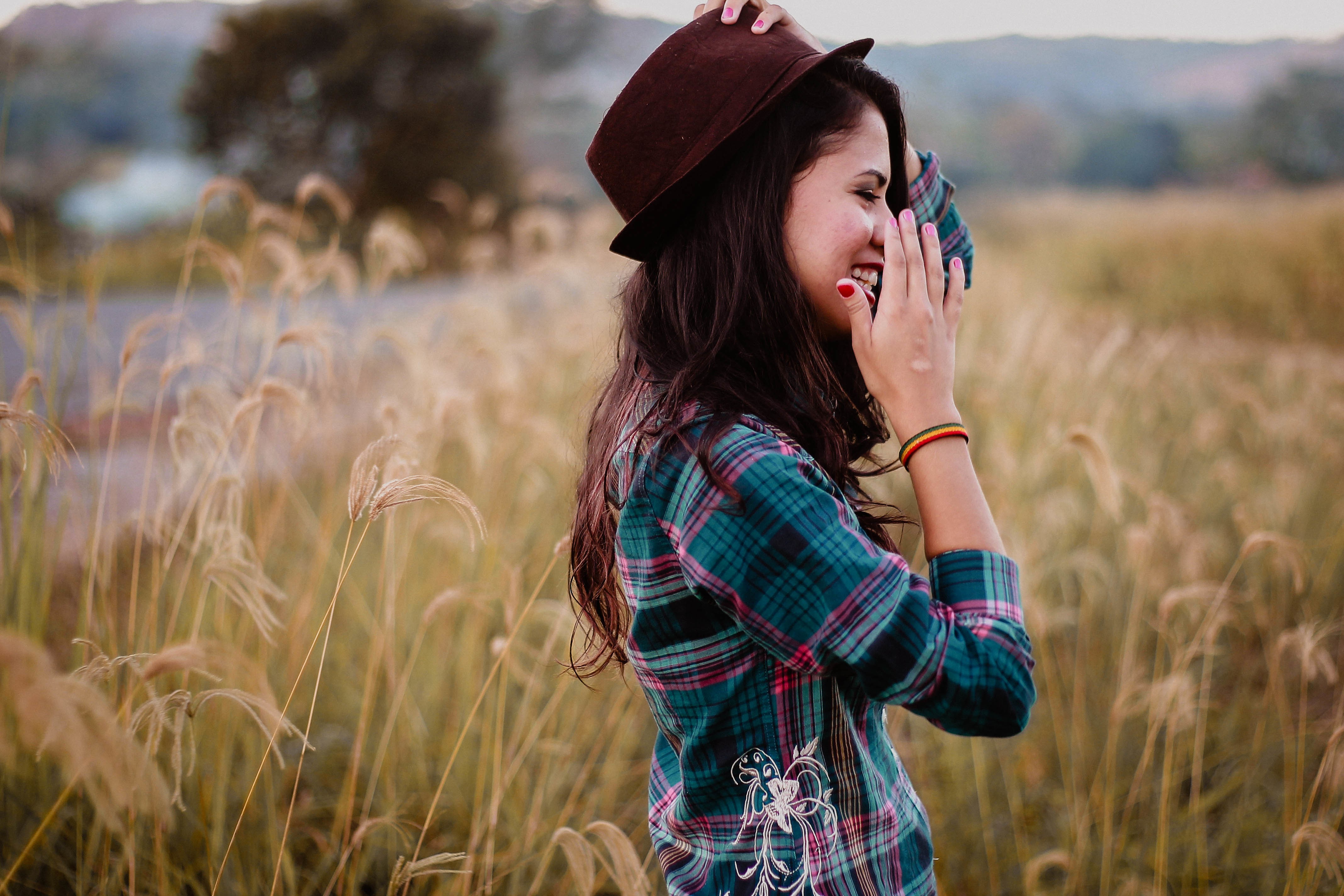 People 4272x2848 women women outdoors brunette women with hats long hair plaid shirt smiling profile outdoors painted nails hat plants shirt