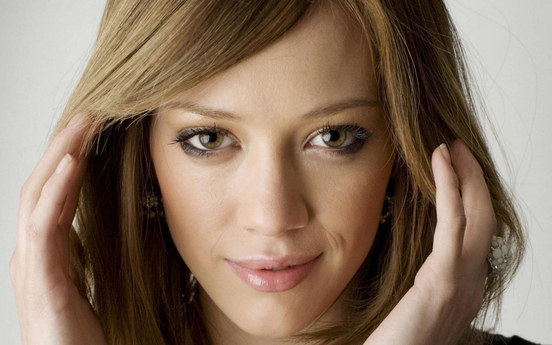 People 1920x1200 Hilary Duff women celebrity actress face brunette smiling studio indoors women indoors simple background looking at viewer
