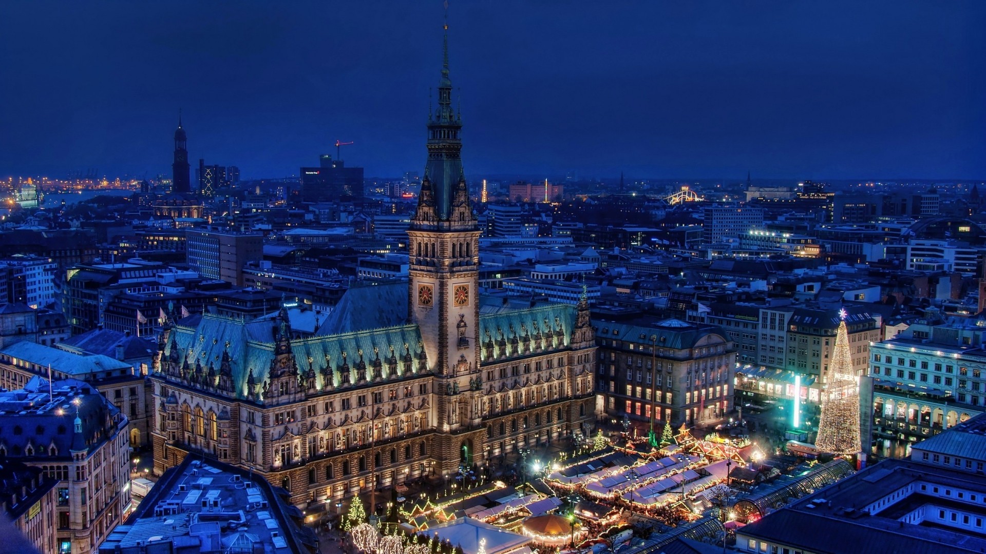 General 1920x1080 cityscape architecture tower old building Germany Hamburg town square rooftops markets Christmas tree evening church winter lights street aerial view city lights blue