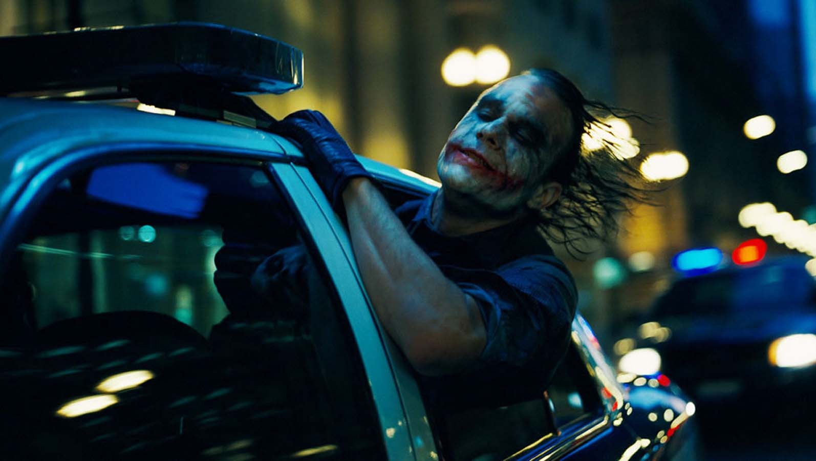 People 1594x900 Joker Heath Ledger The Dark Knight police cars car villains Batman movies men film stills
