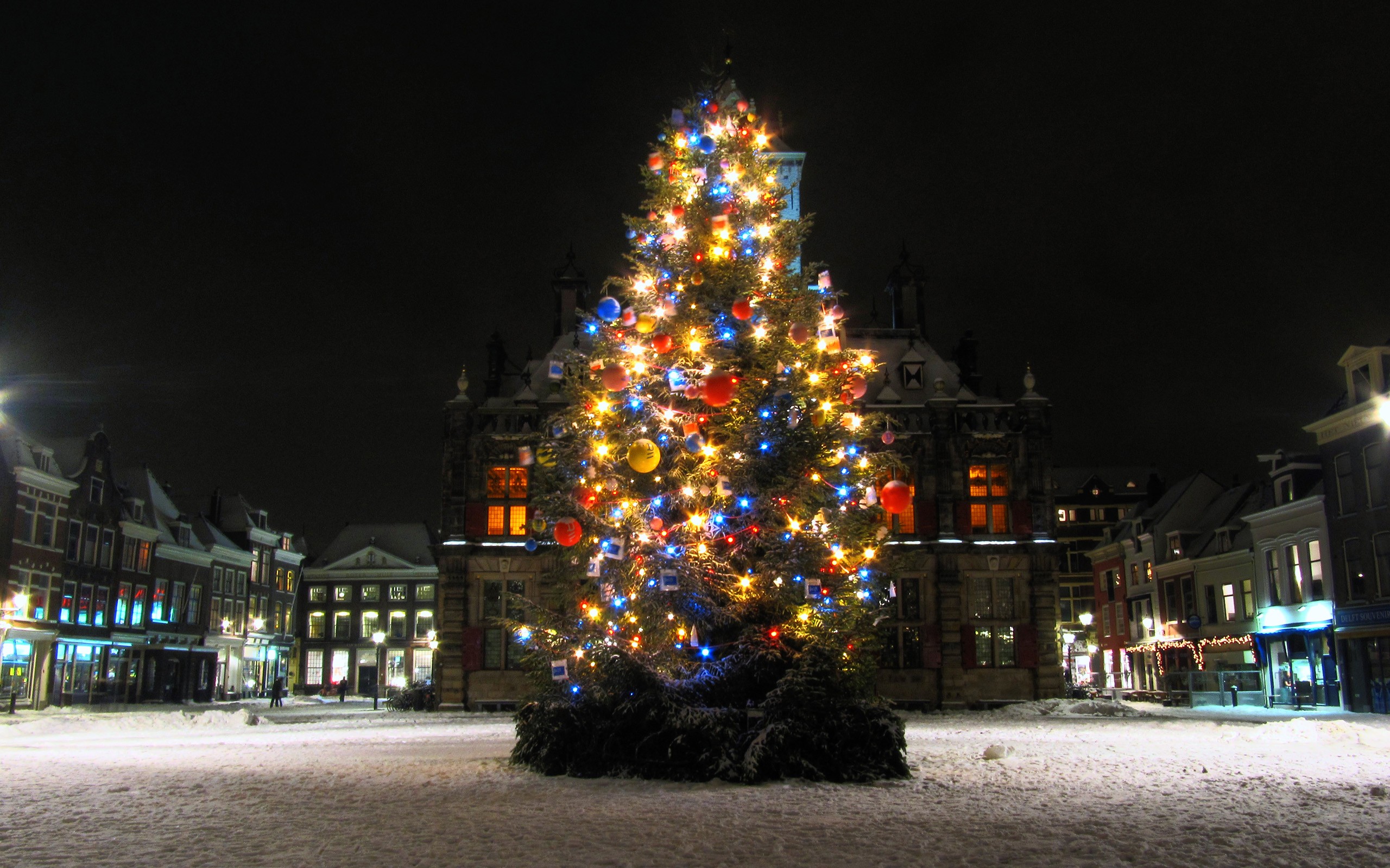 General 2560x1600 Christmas snow fir-tree Christmas ornaments  holiday urban lights winter outdoors Christmas tree