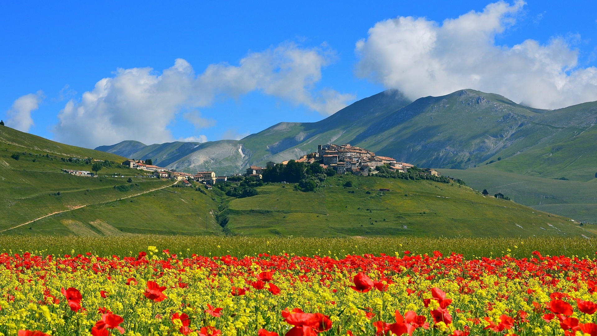 General 1920x1080 nature landscape clouds trees Italy architecture castle hills ancient mountains old building village field flowers grass poppies path summer