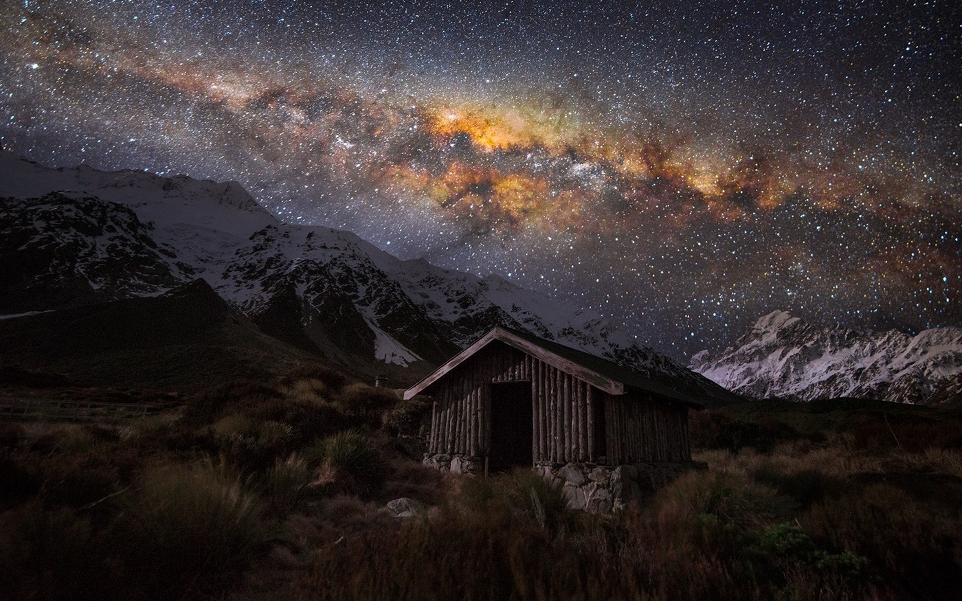 General 1400x875 nature landscape starry night hut Milky Way snowy peak grass mountains space New Zealand universe stars sky