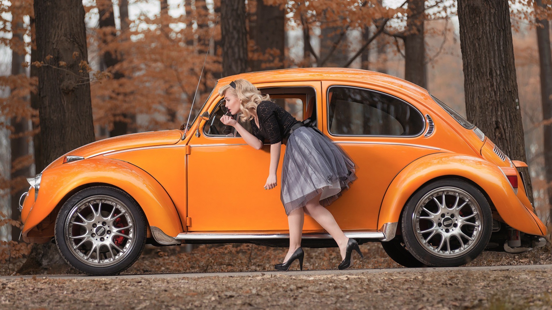 People 1920x1080 women model blonde long hair women outdoors skirt black outfits car nature trees forest fall red lipstick high heels stiletto Volkswagen Beetle old car hairband vehicle orange cars heels black heels
