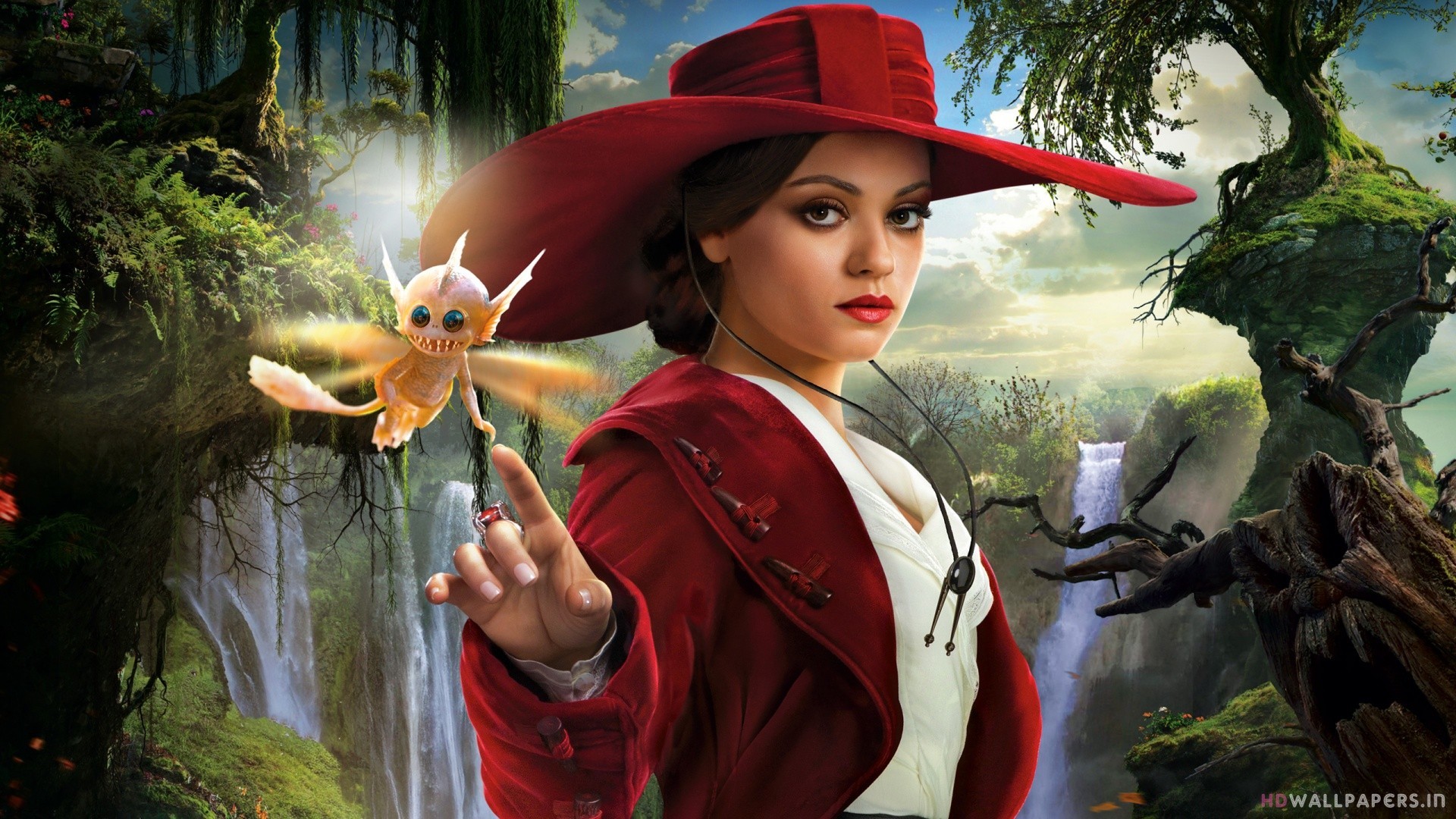 People 1920x1080 movies Oz the Great and Powerful Mila Kunis women red hats tied hair hand gesture brown eyes fantasy girl closed mouth women with hats hat looking at viewer digital art watermarked