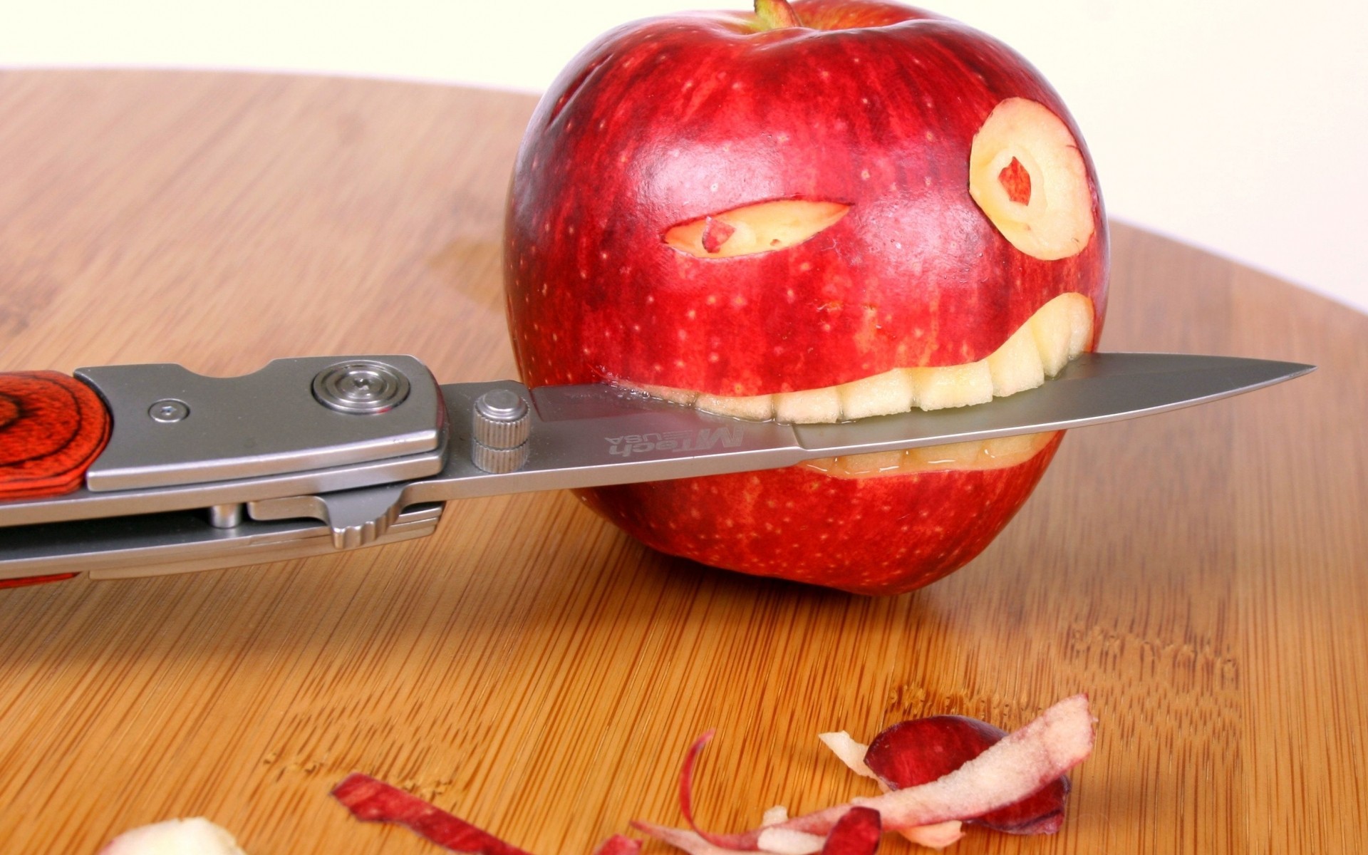 General 1920x1200 apples knife food fruit humor wood wooden table weapon wooden surface closeup