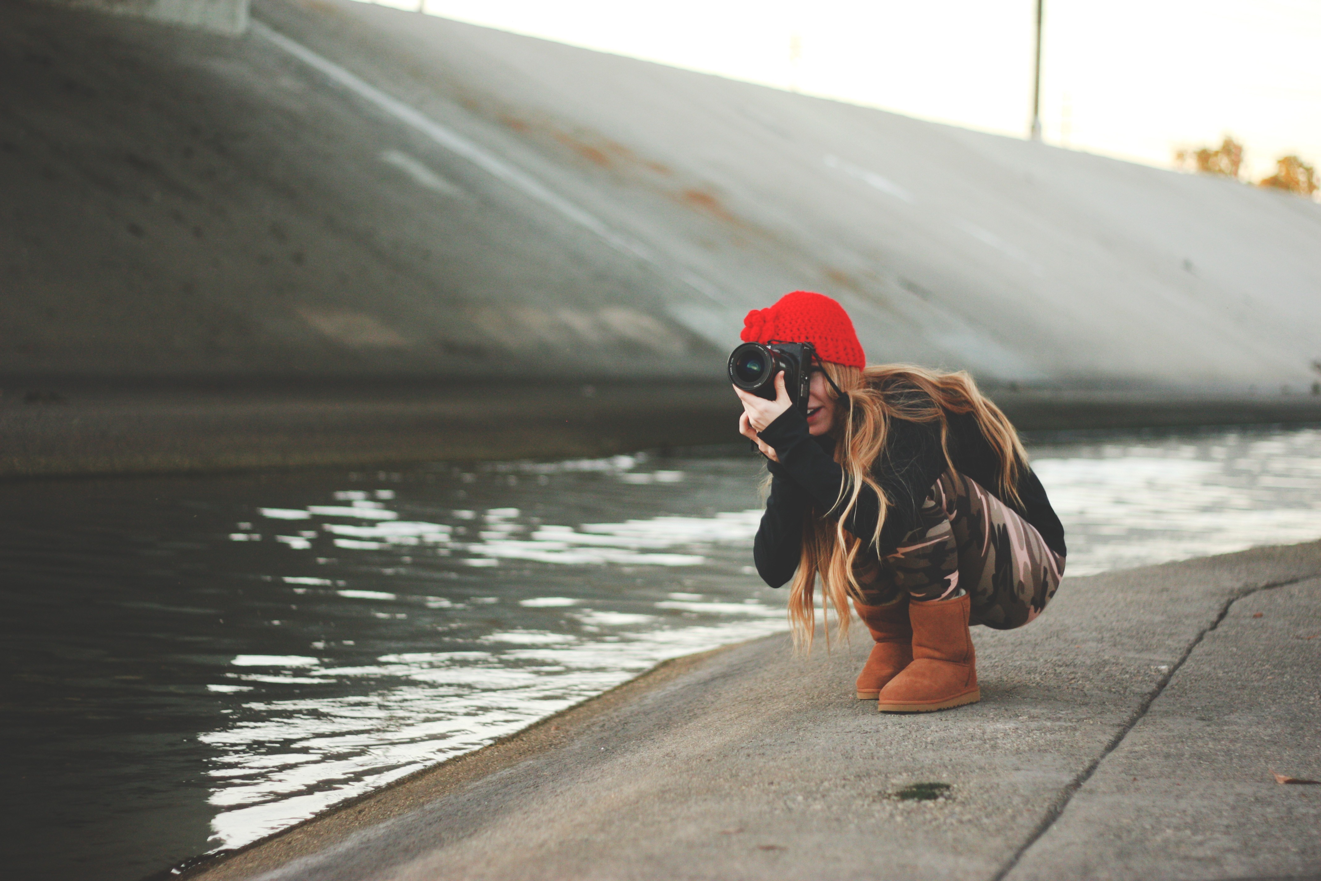 People 4272x2848 camera photographer women women outdoors urban hat wool cap squatting water