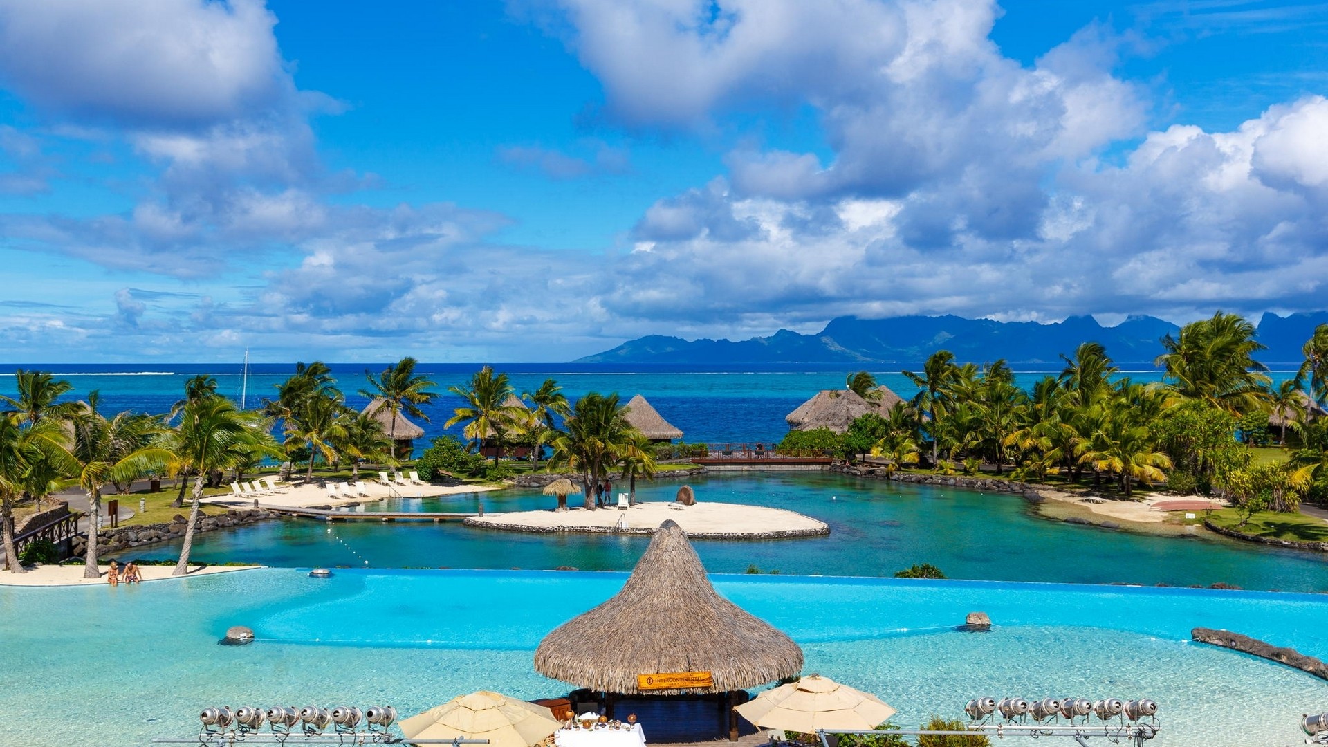 General 1920x1080 tropical resort Tahiti French Polynesia sea beach swimming pool palm trees island mountains clouds summer