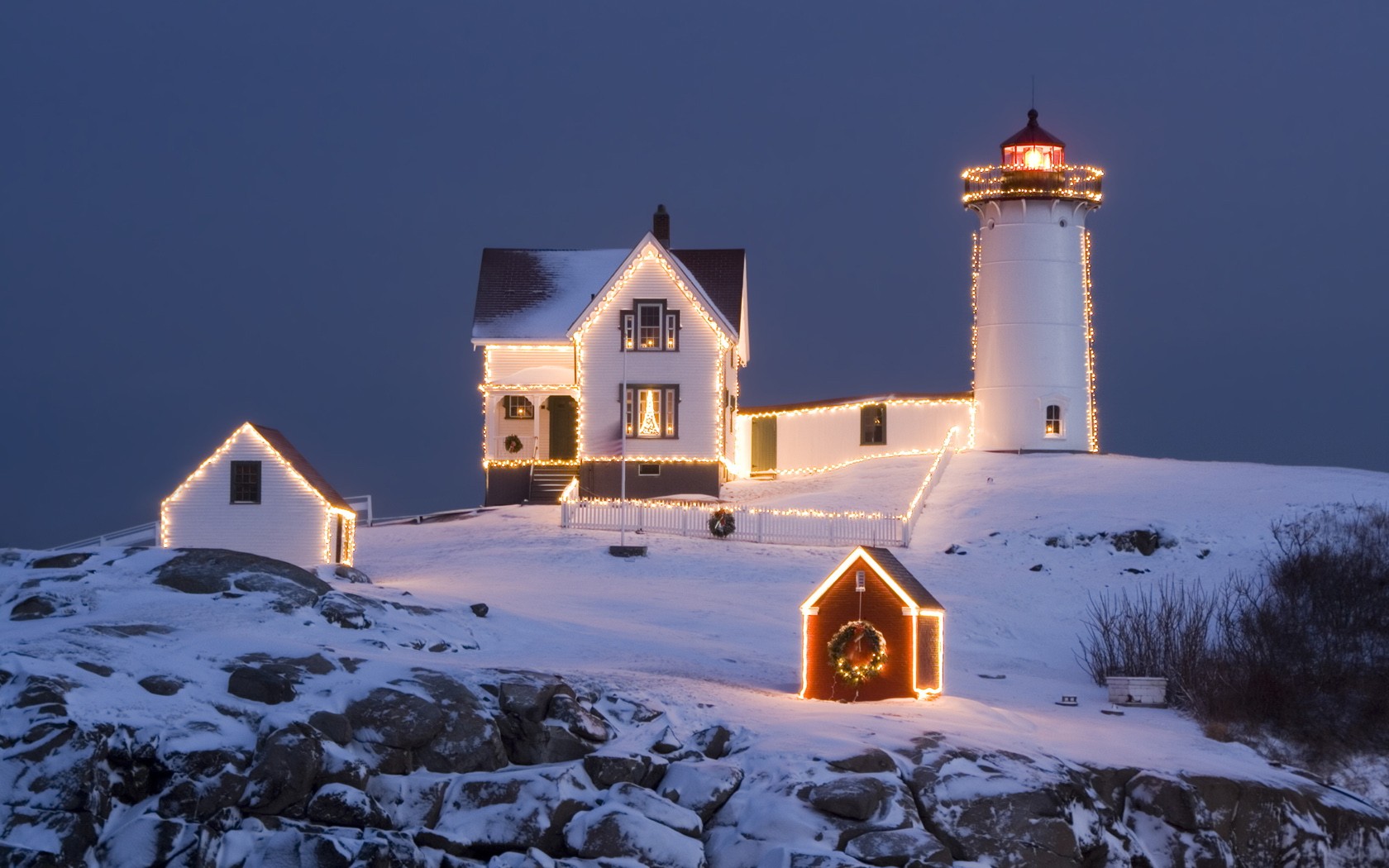 General 1680x1050 house lighthouse lights night snow Christmas lights winter calm Christmas idyllic