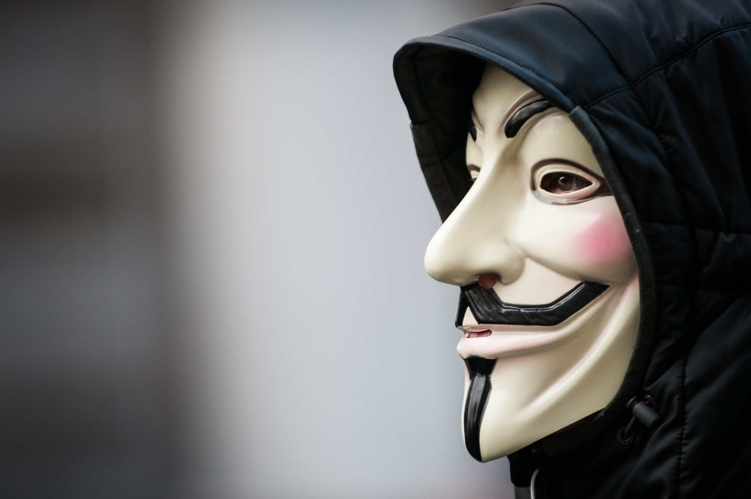 General 2500x1660 Anonymous (hacker group) Guy Fawkes mask mask looking into the distance