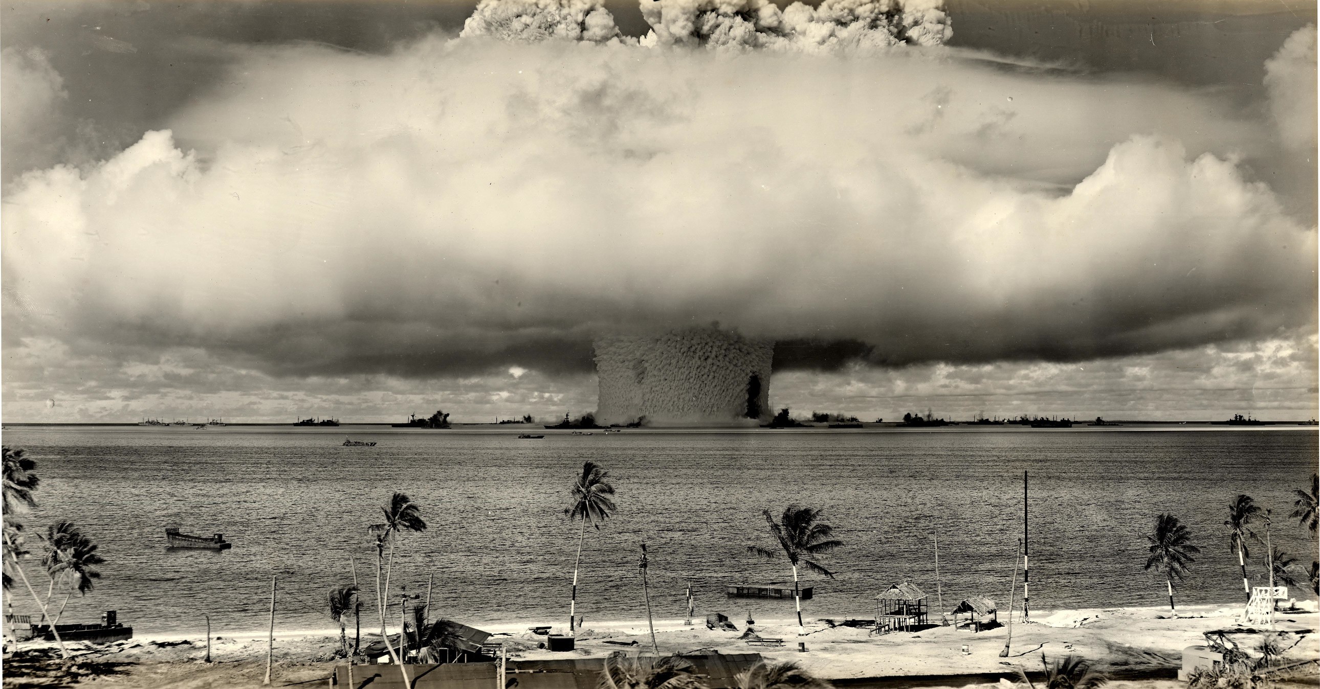 General 2580x1348 atomic bomb military Pacific Ocean explosion nuclear palm trees vintage Bikini Atoll sepia mushroom clouds