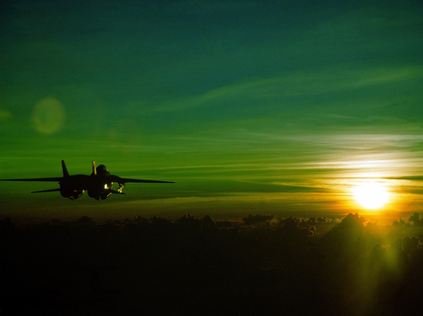 General 1604x1200 F-14 Tomcat sunset green jets aircraft military aircraft vehicle Sun sky military military vehicle
