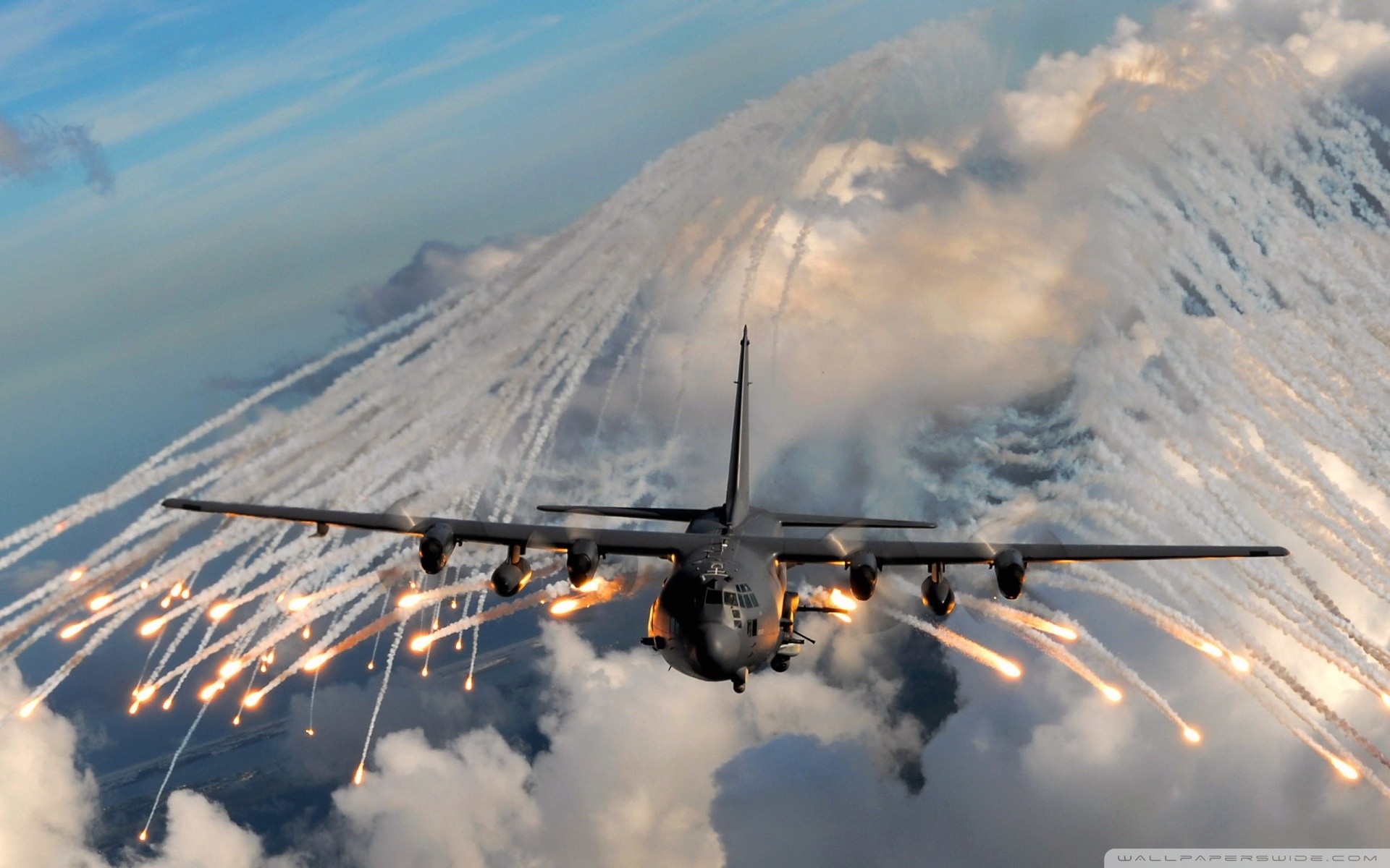 General 1920x1200 military aircraft vehicle military aircraft Lockheed AC-130 military vehicle flares US Air Force watermarked American aircraft Lockheed