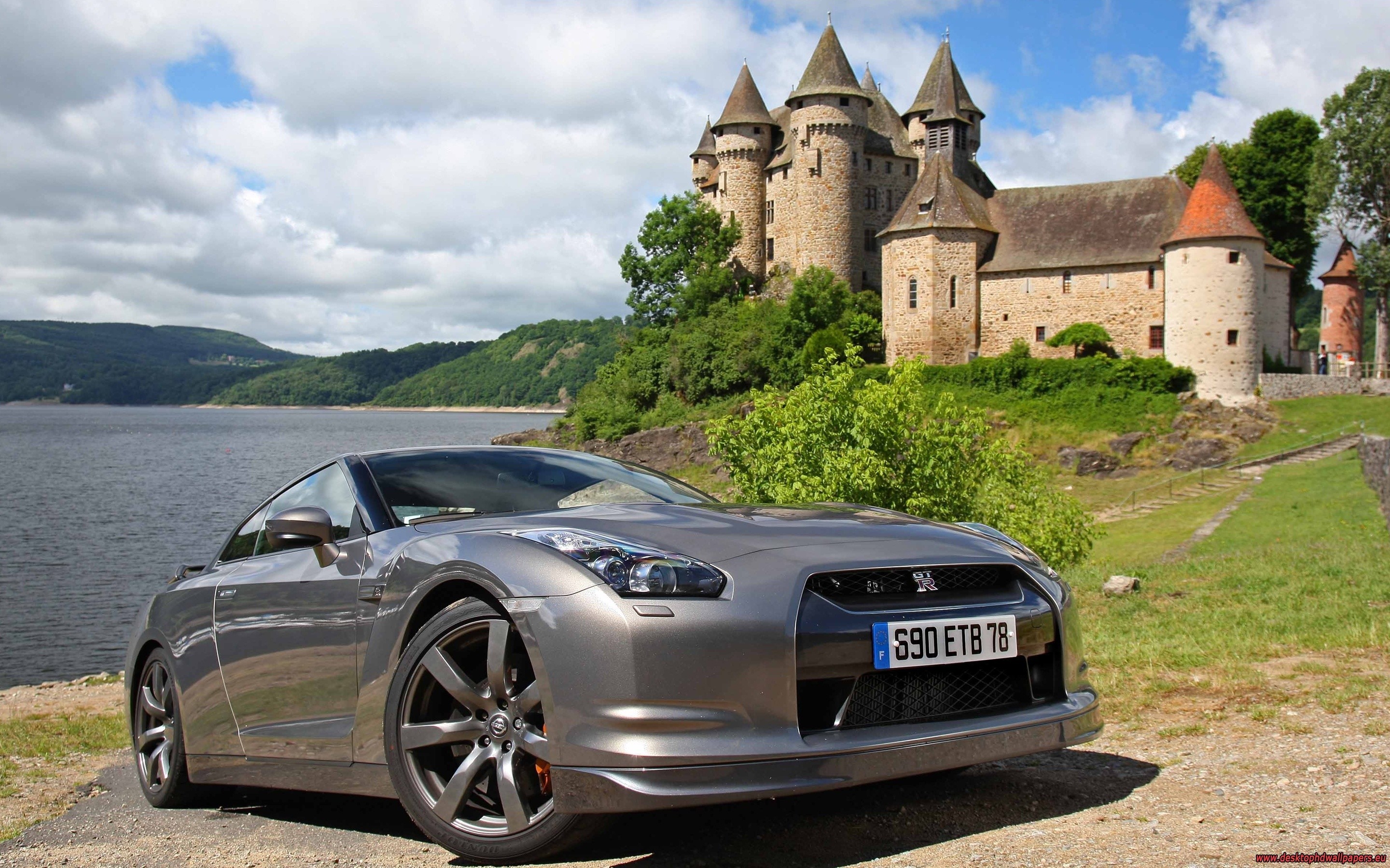 General 2880x1800 Nissan GT-R car Nissan numbers building vehicle silver cars Japanese cars frontal view closeup watermarked water clouds sky trees sunlight grass