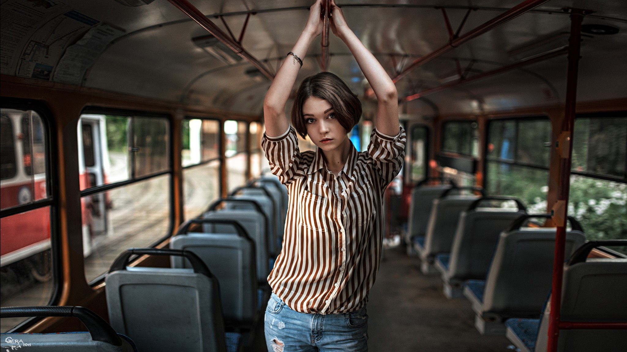 People 2048x1151 women model portrait short hair buses Georgy Chernyadyev brunette looking at viewer Olya Pushkina torn jeans jeans 2015 (Year) tram vehicle standing striped clothing arms up