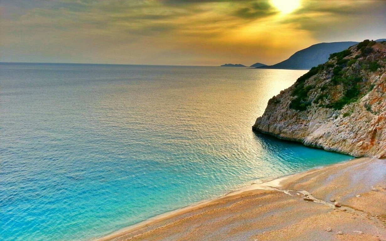 General 1230x768 landscape nature sunset Turkey beach sea coast sand rocks hills turquoise water clouds horizon sky