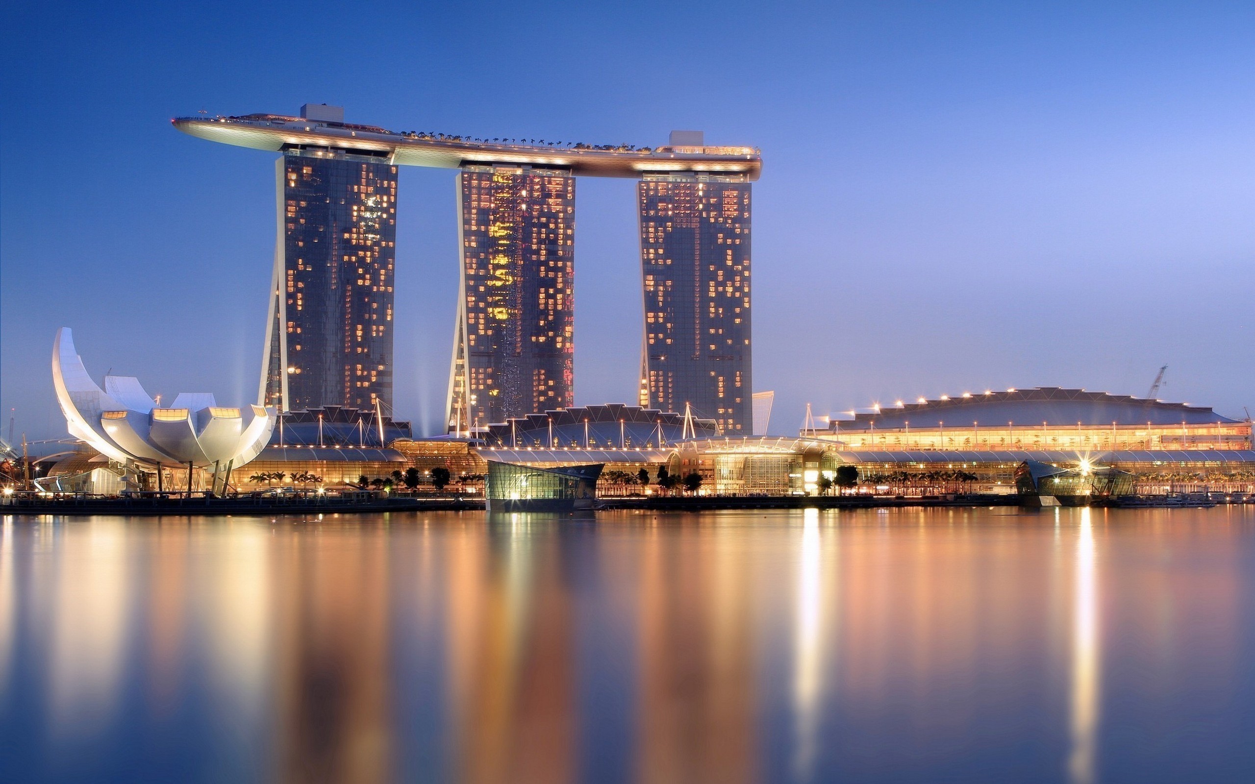 General 2560x1600 building reflection Singapore skyscraper evening lights city lights city sea Asia landmark