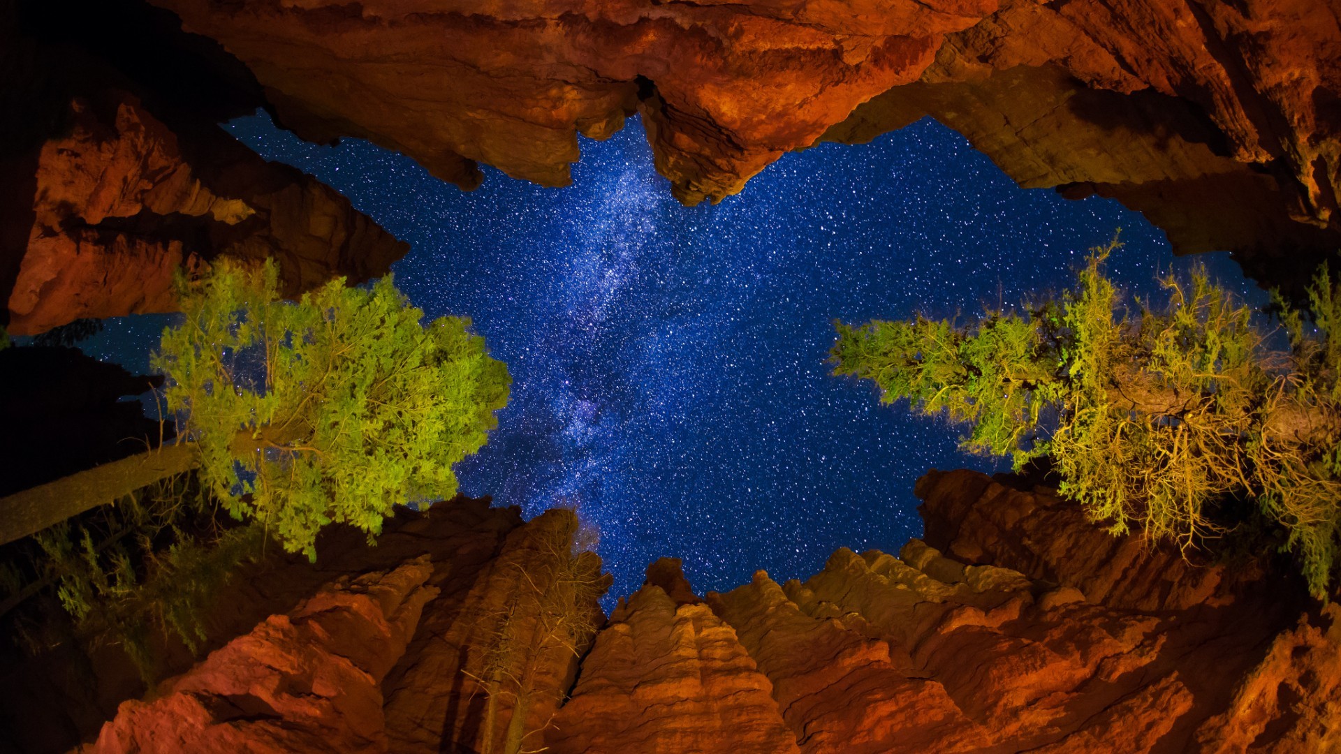 General 1920x1080 worm's eye view clouds nature night sky stars Milky Way national park Utah USA trees mountains rocks valley bottom view