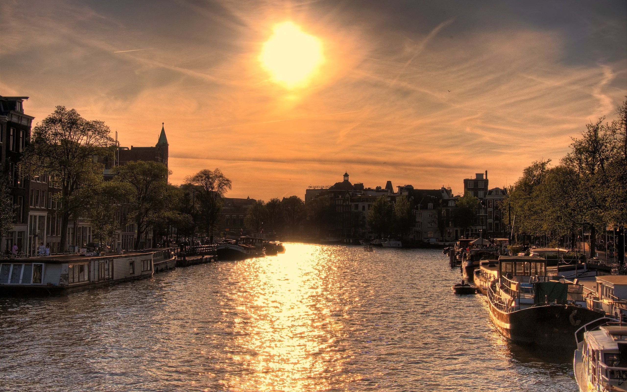 General 2560x1600 Amsterdam nature river Sun boat cityscape sunlight