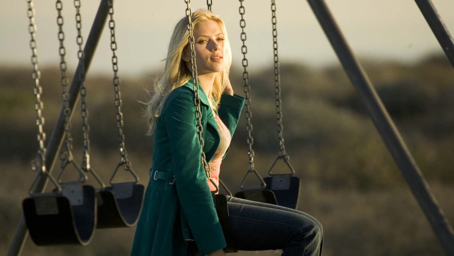 People 1594x900 women actress Scarlett Johansson blonde long hair swings green coat  natural light sitting women outdoors American women