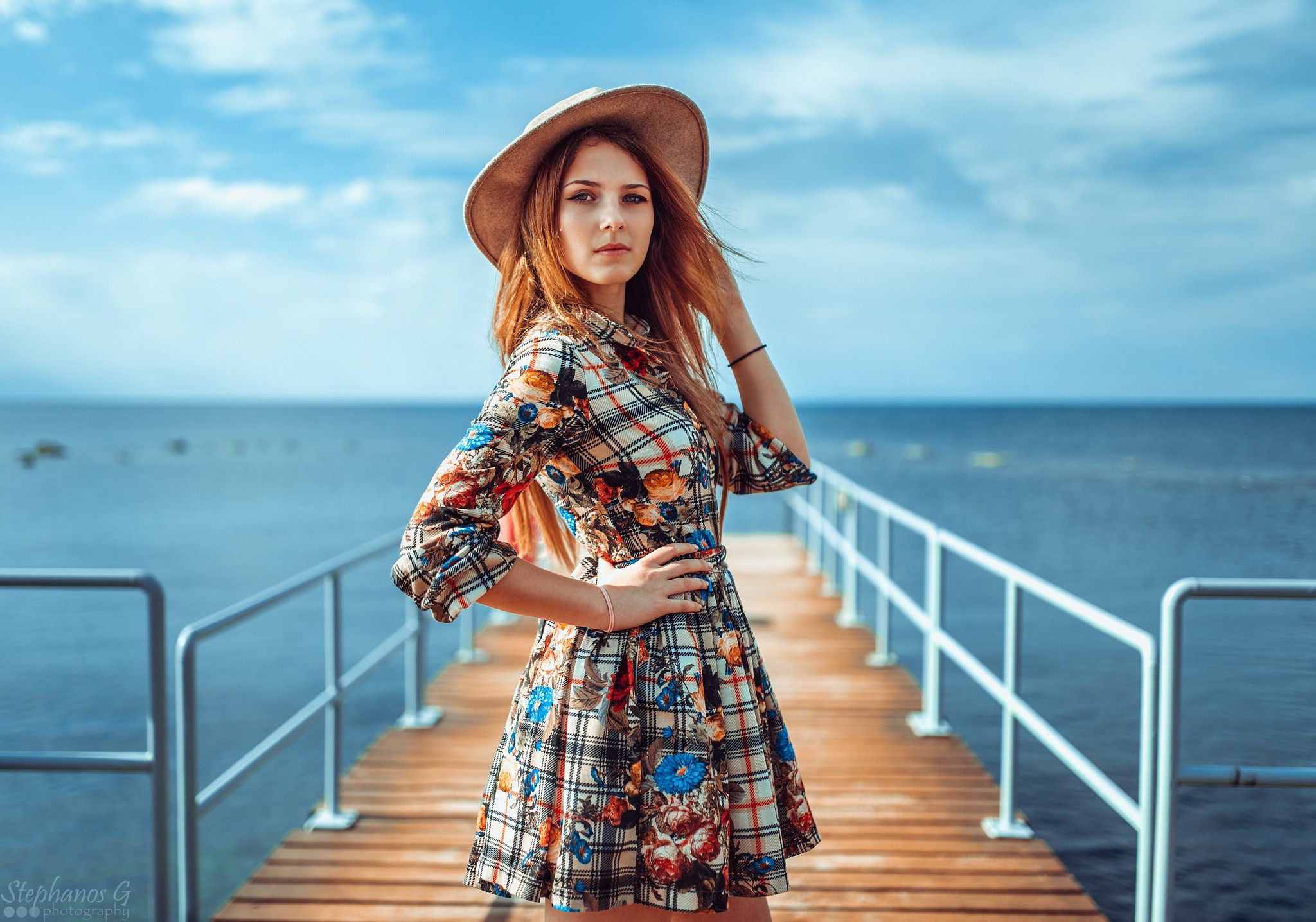 People 2048x1436 women model redhead blue eyes dress hat pier colorful women outdoors women with hats looking at viewer plaid clothing long hair Stephanos Georgiou watermarked sea water