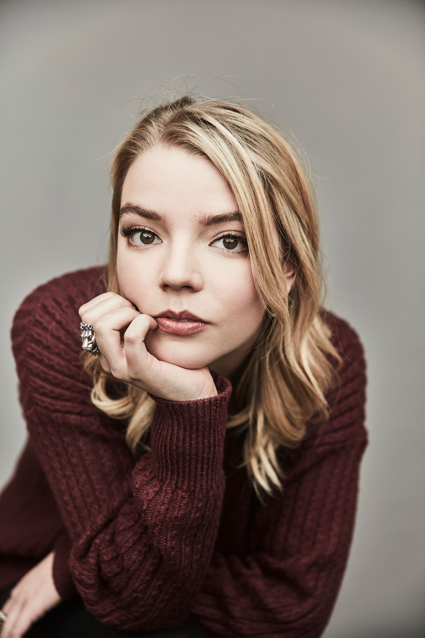 People 1365x2048 Anya Taylor-Joy  women actress blonde sweater simple background looking at viewer portrait
