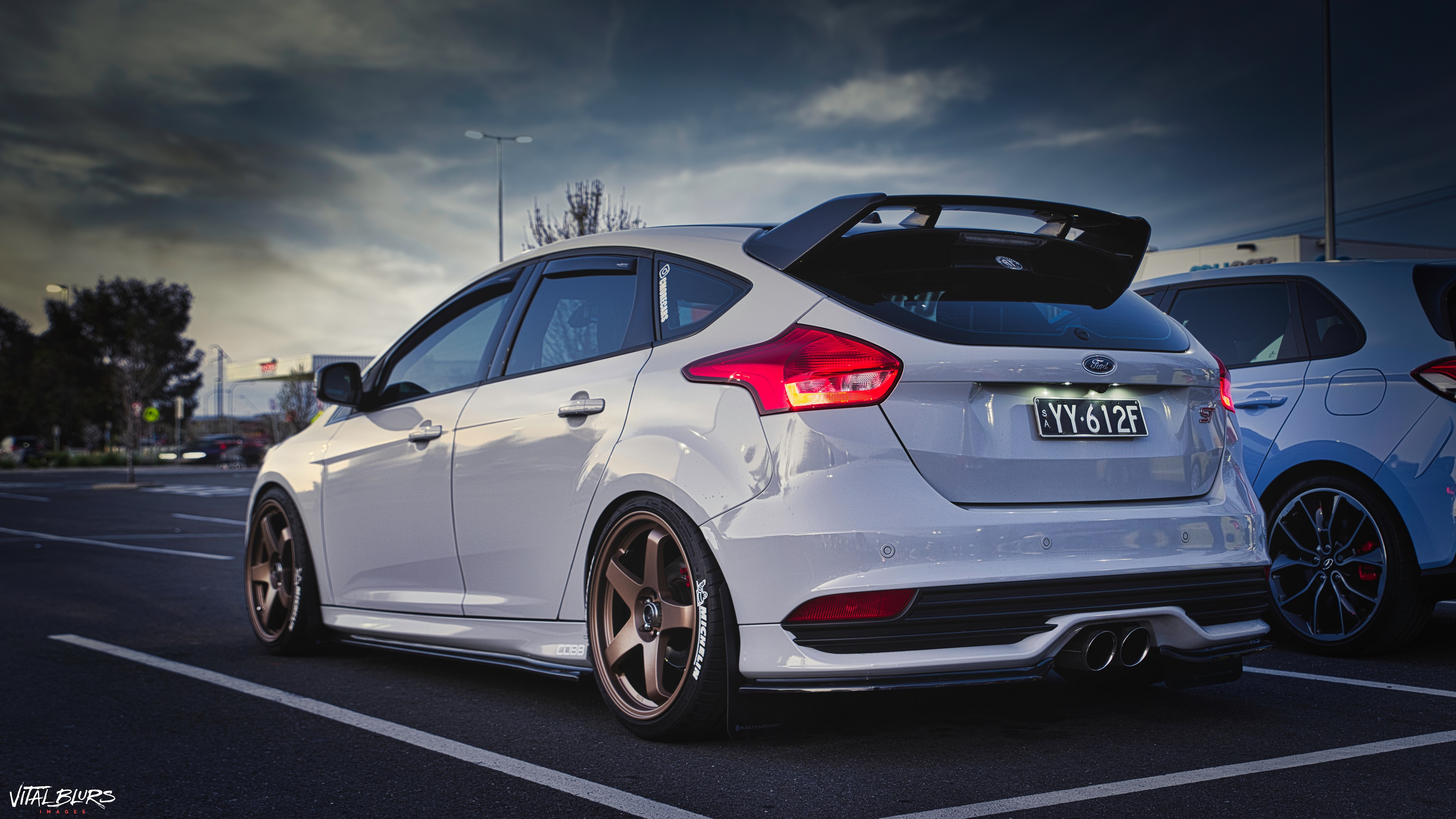 General 3840x2160 Ford car vehicle outdoors car park sky clouds Ford Focus ST gray cars colored wheels hatchbacks european cars sports car British cars