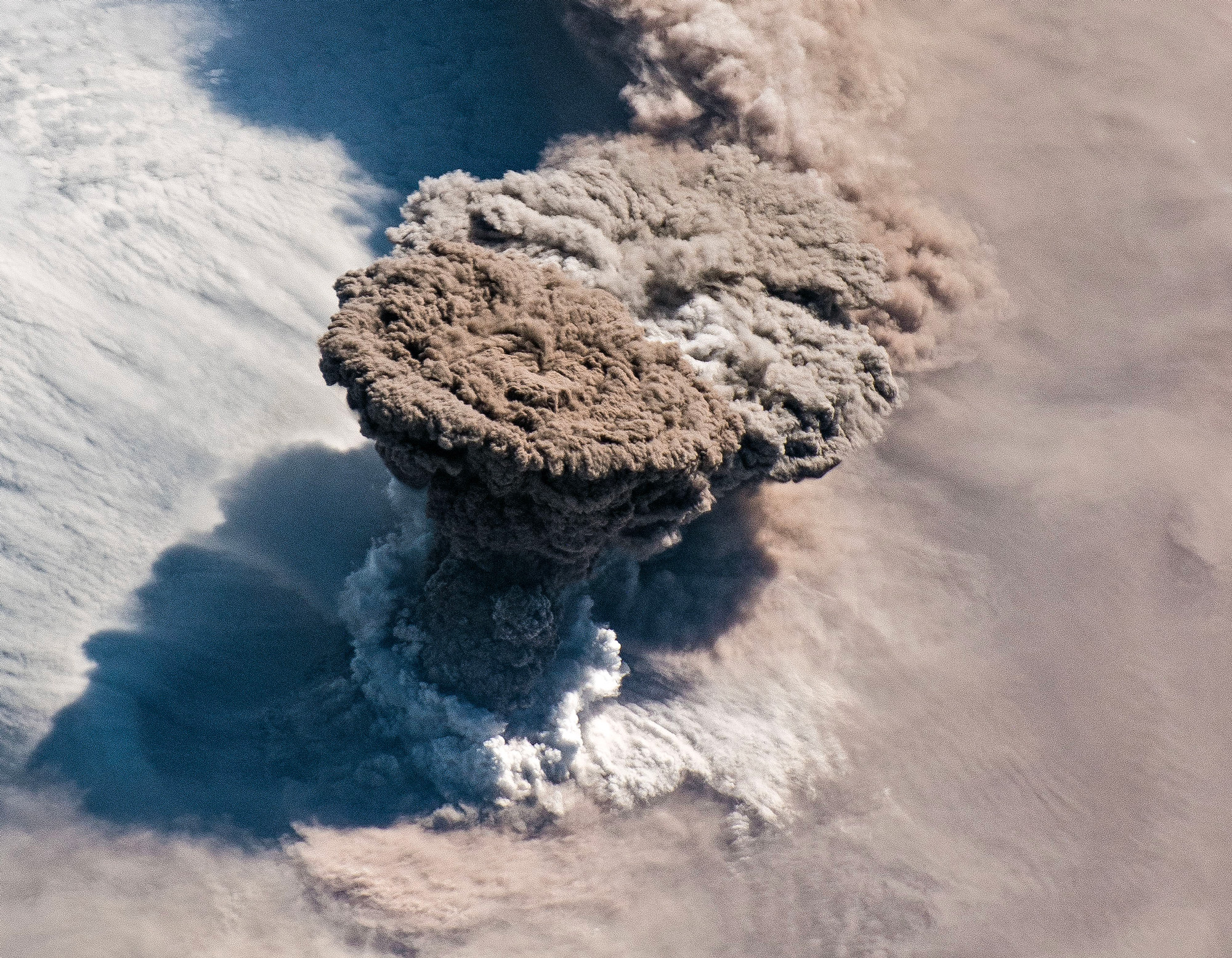 General 2000x1555 aerial view top view volcano volcanic eruption eruption film grain Russia NASA smoke Raikoke volcano