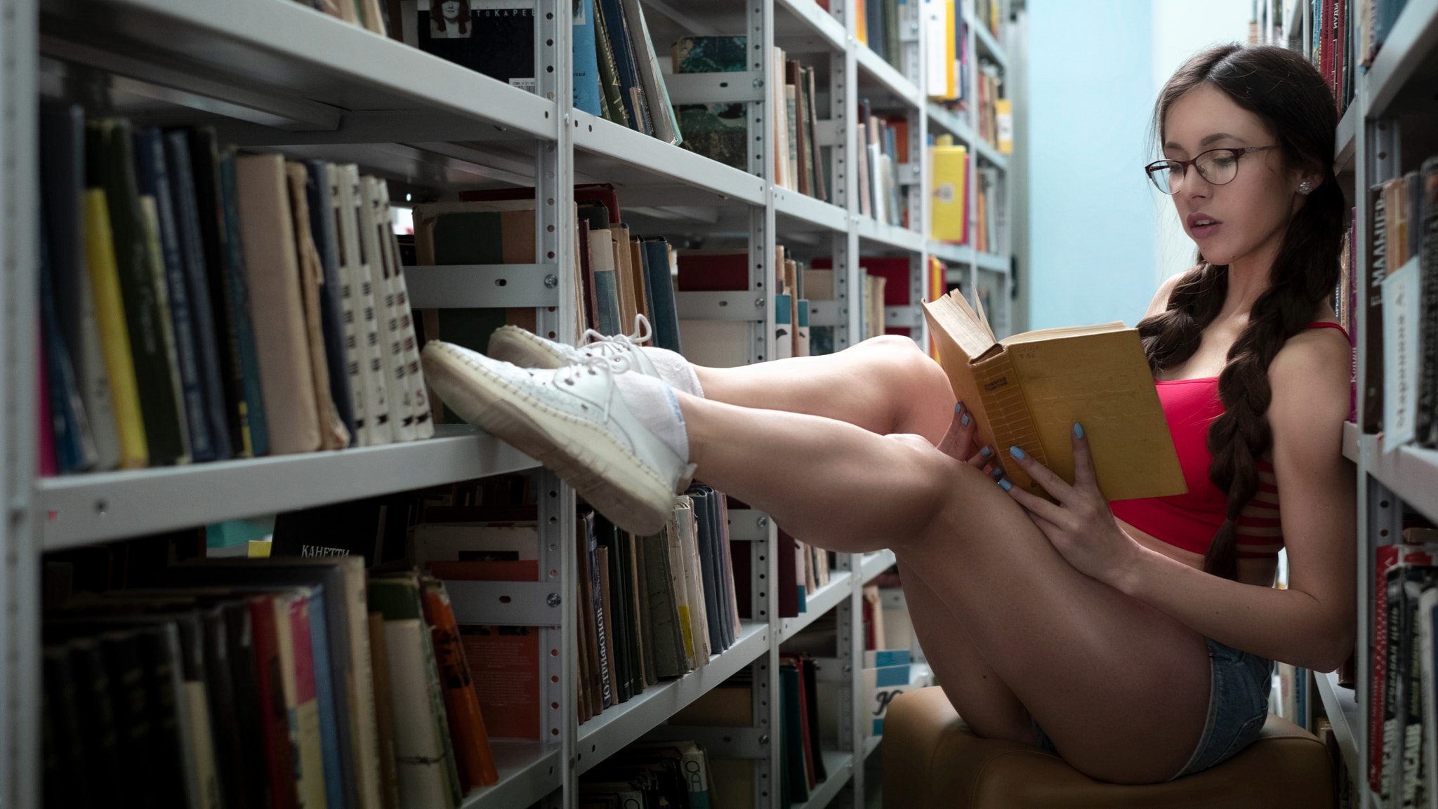 People 2048x1153 women sitting jean shorts sneakers books twintails women with glasses white socks painted nails brunette library reading
