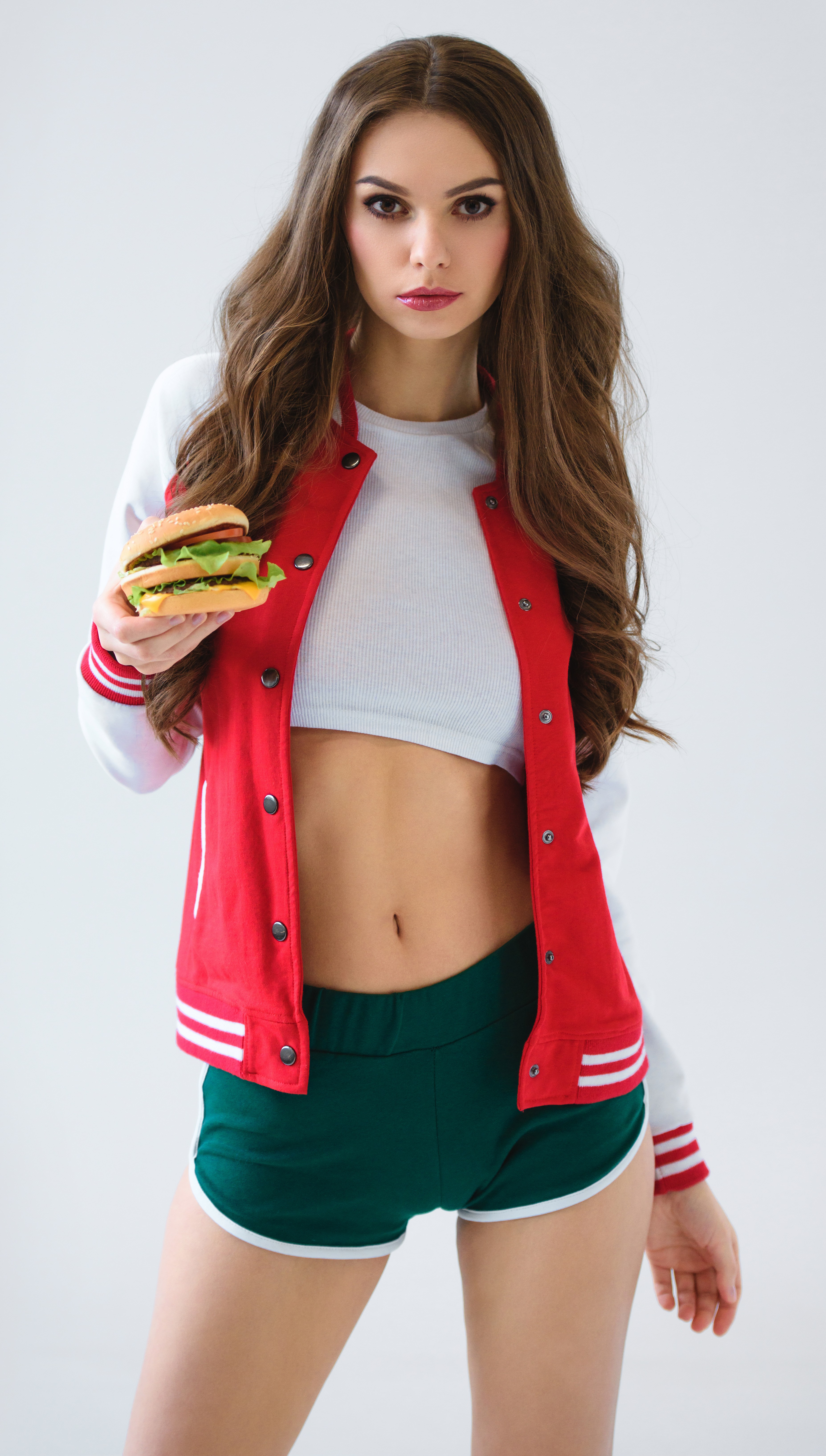 People 3709x6540 brunette jacket burgers belly short shorts short tops white tops long hair white background looking at viewer standing open jacket portrait makeup pink lipstick brown eyes women