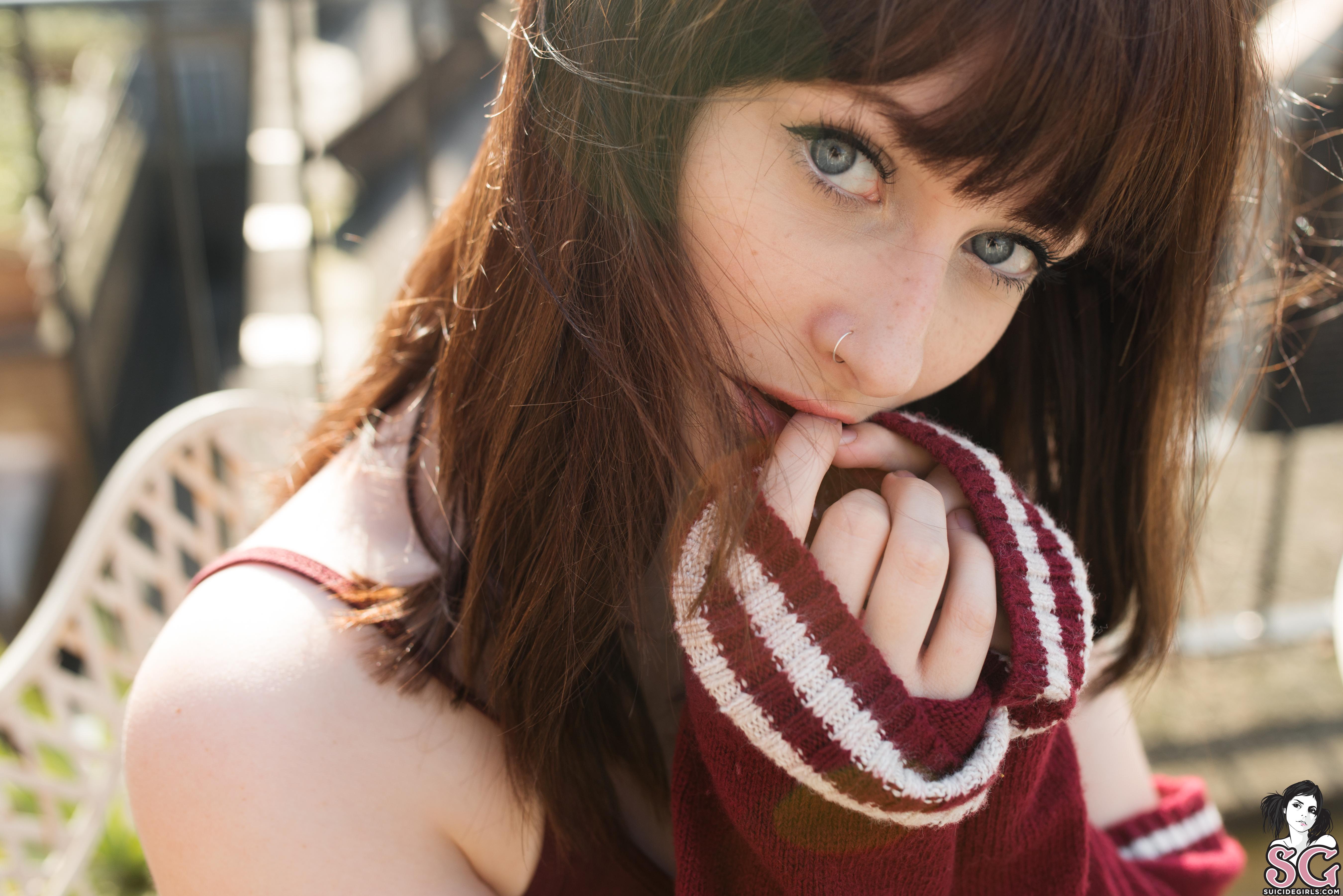 People 5400x3603 Jessica Lou Suicide Girls women brunette sweater bare shoulders looking at viewer sensual gaze blue eyes face open mouth depth of field piercing finger in mouth red bra moles closeup windy British British women watermarked women outdoors nose ring model