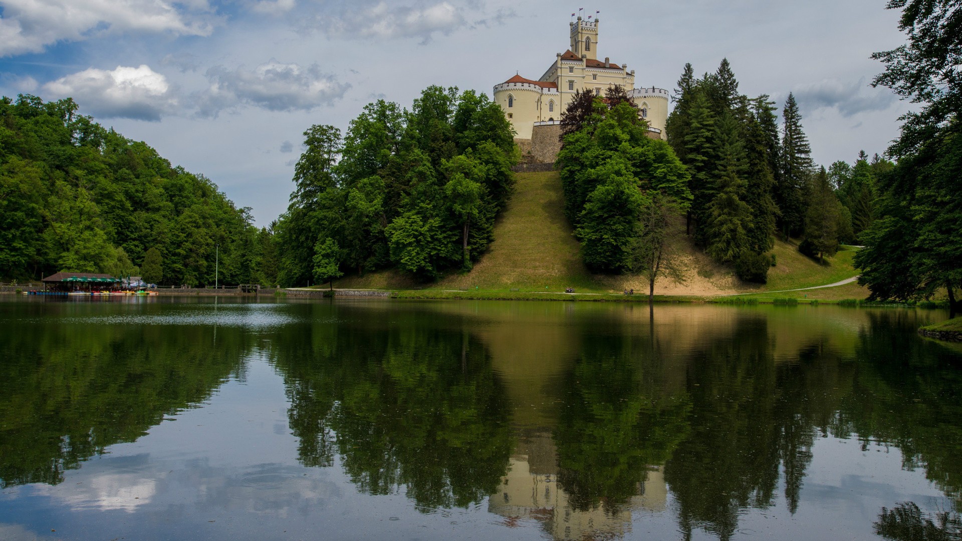 General 1920x1080 architecture ancient castle trees nature forest water lake hills grass reflection tower flag clouds path Croatia Europe Trakoščan