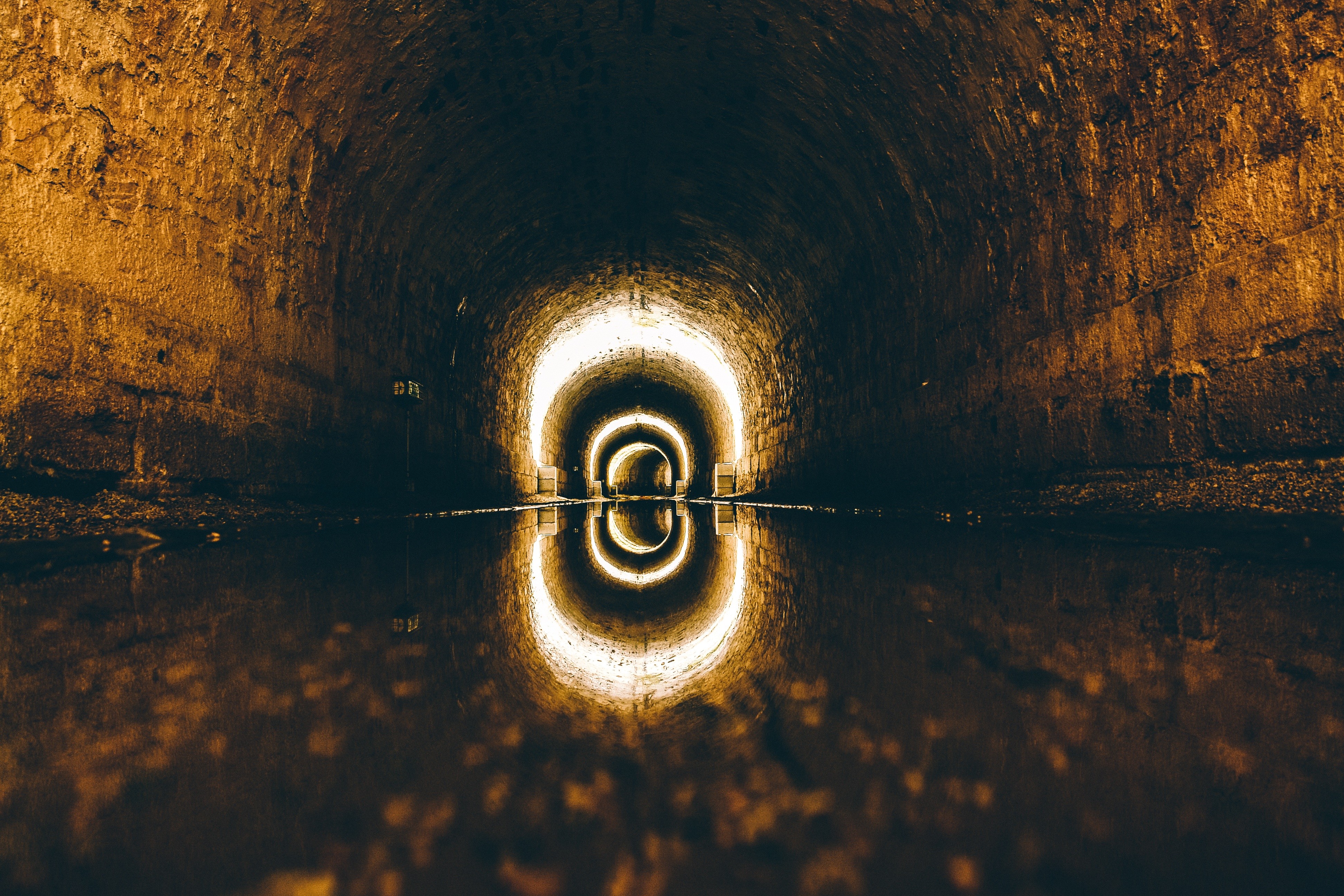 General 3888x2592 tunnel lights arch worm's eye view reflection water brown dark wet low light